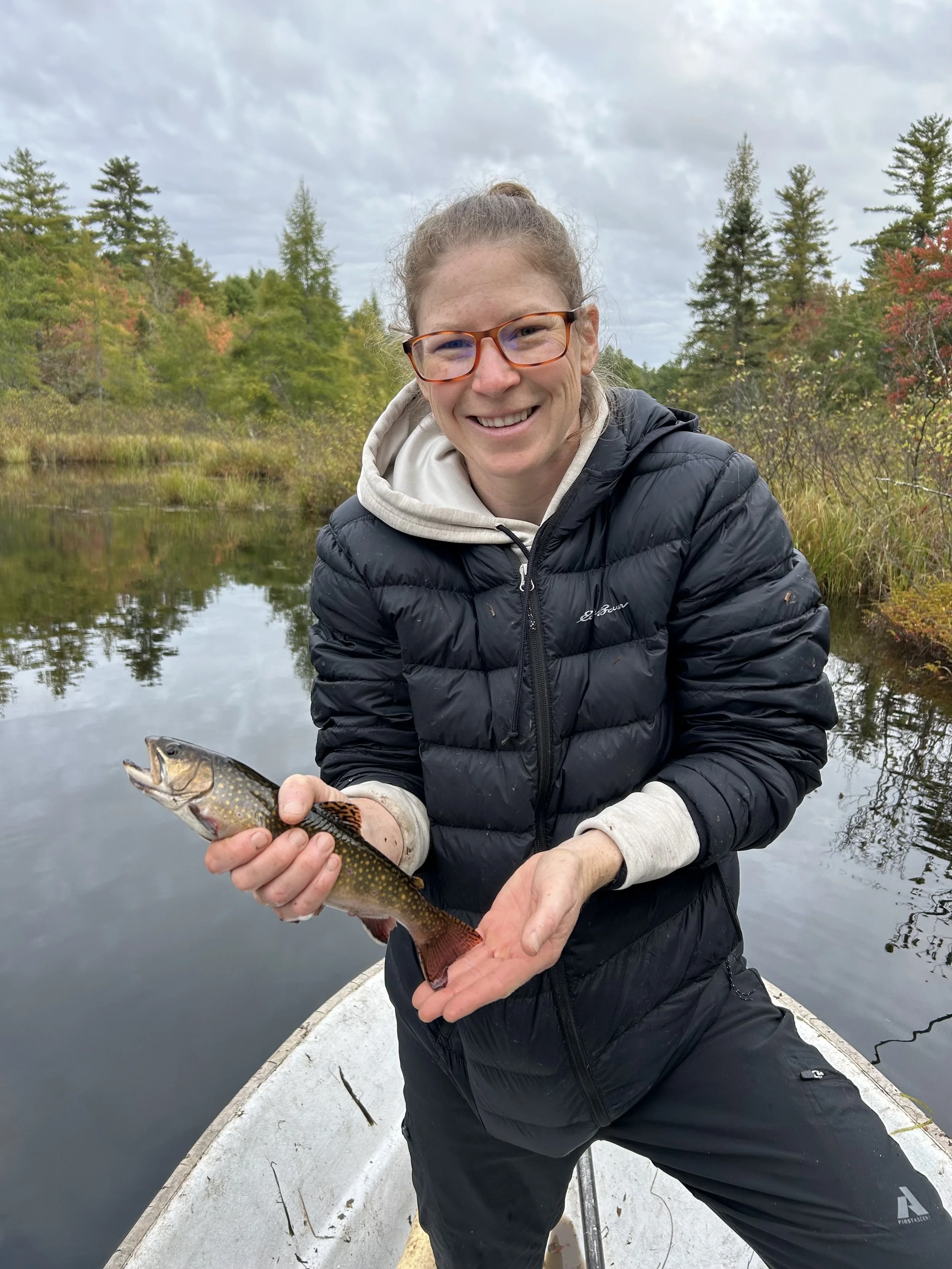 Kristy, Reading specialist, is smiling in front of a