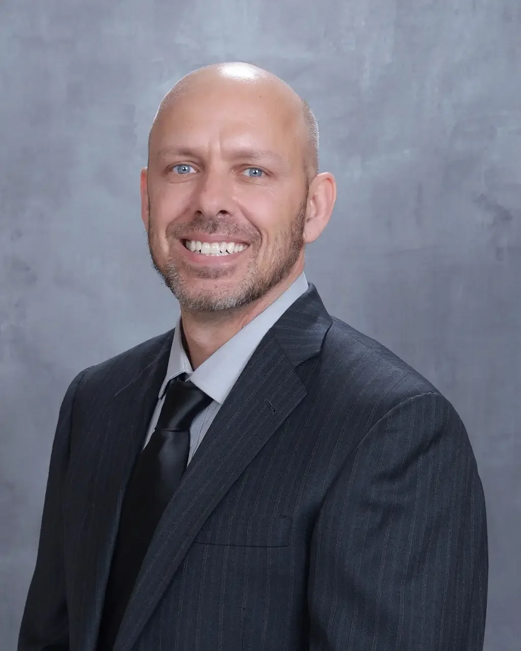 Portrait of Giovanni Parochetti PMHNP-BC psychiatric nurse practitioner at Huron River Psychiatry in Ann Arbor Michigan.