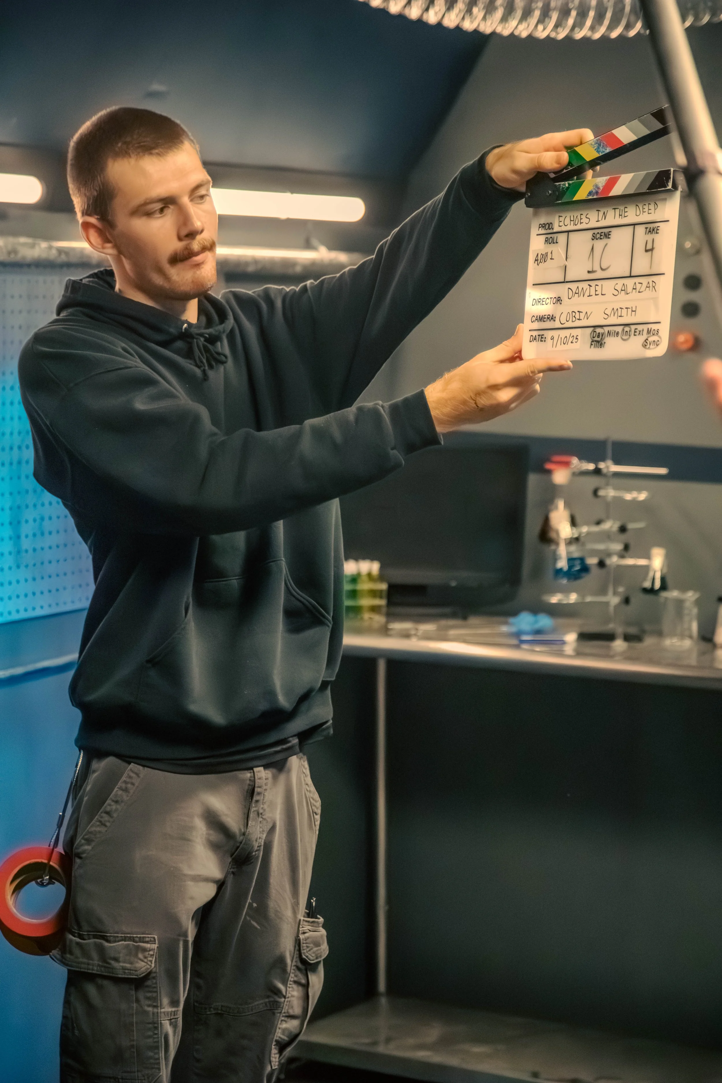 Student holding slate