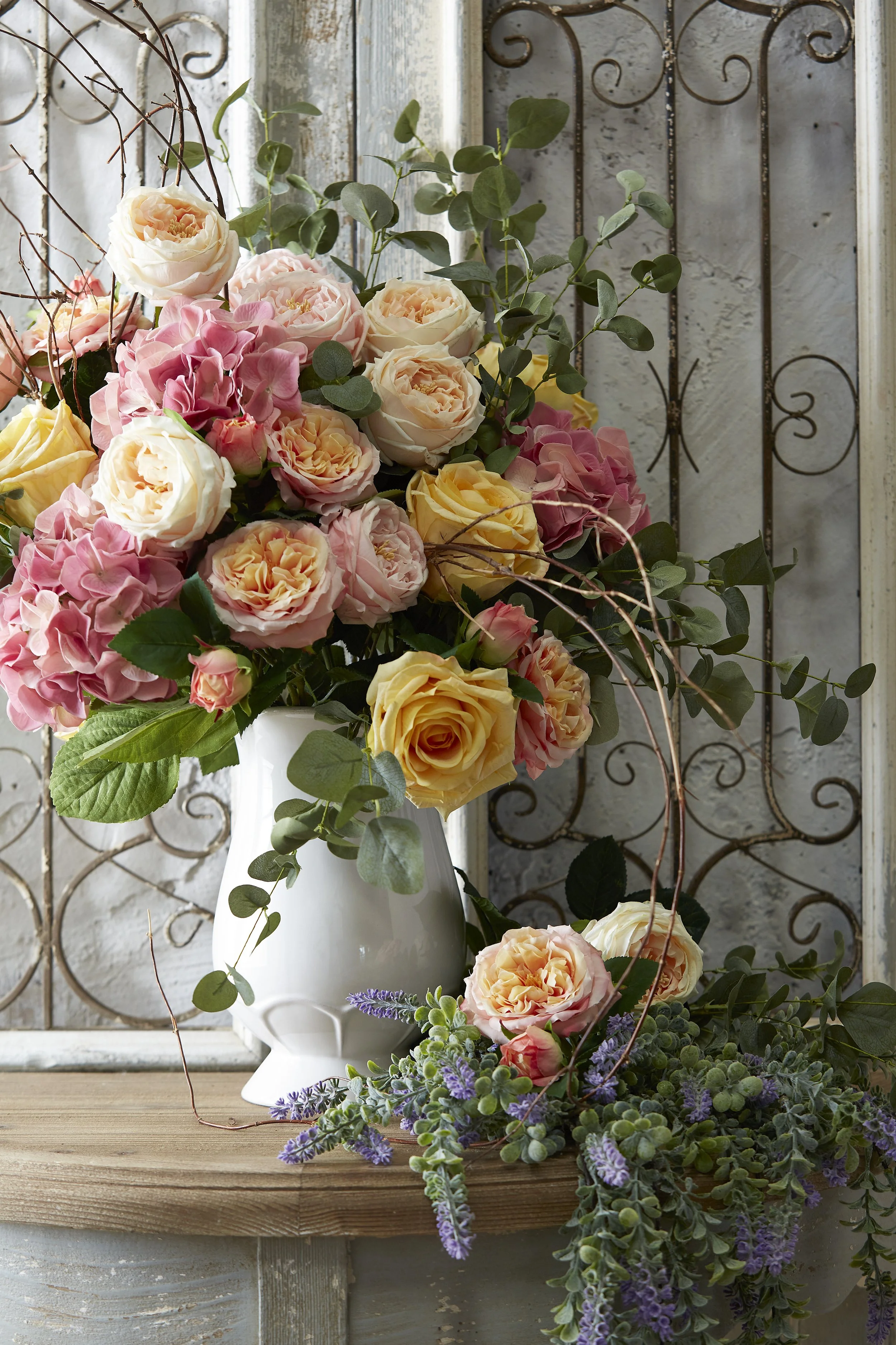 Tuscany floral display, flowers in a white vase