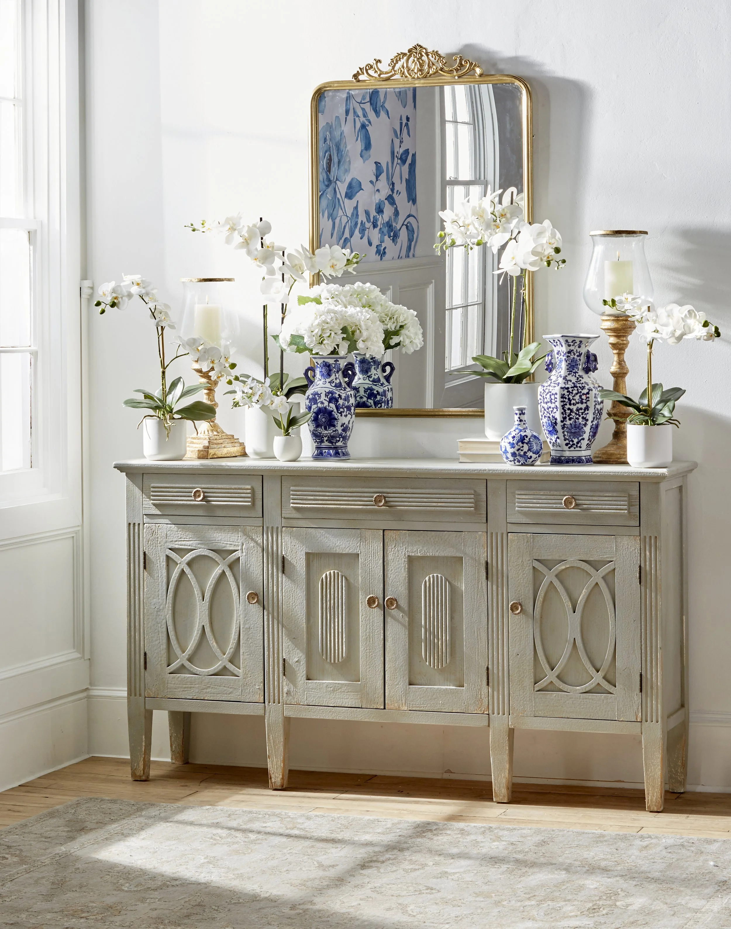 orchids, blue and white decor, storage solution, sideboard, mirror