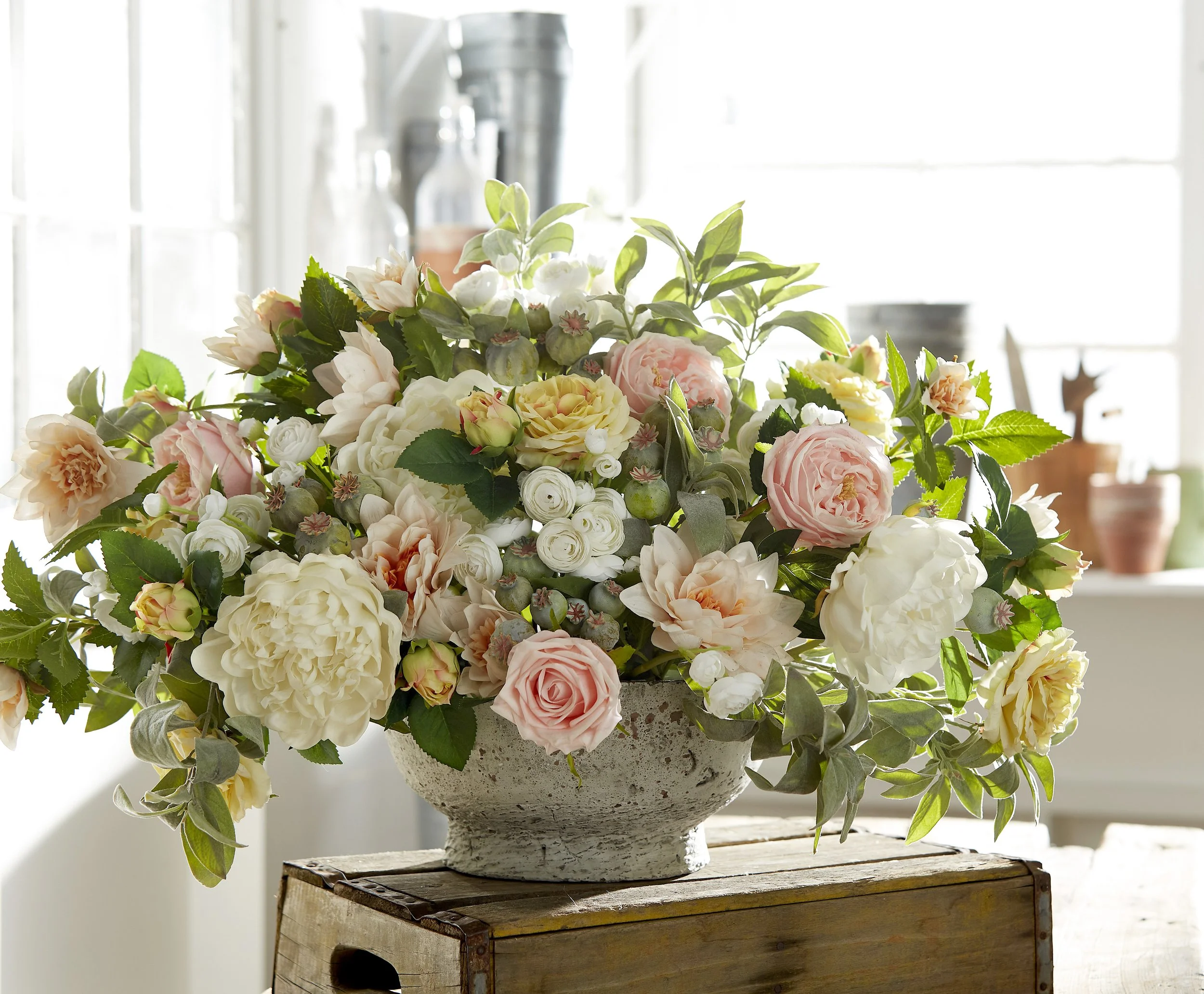 floral display in a concrete vase, large floral display