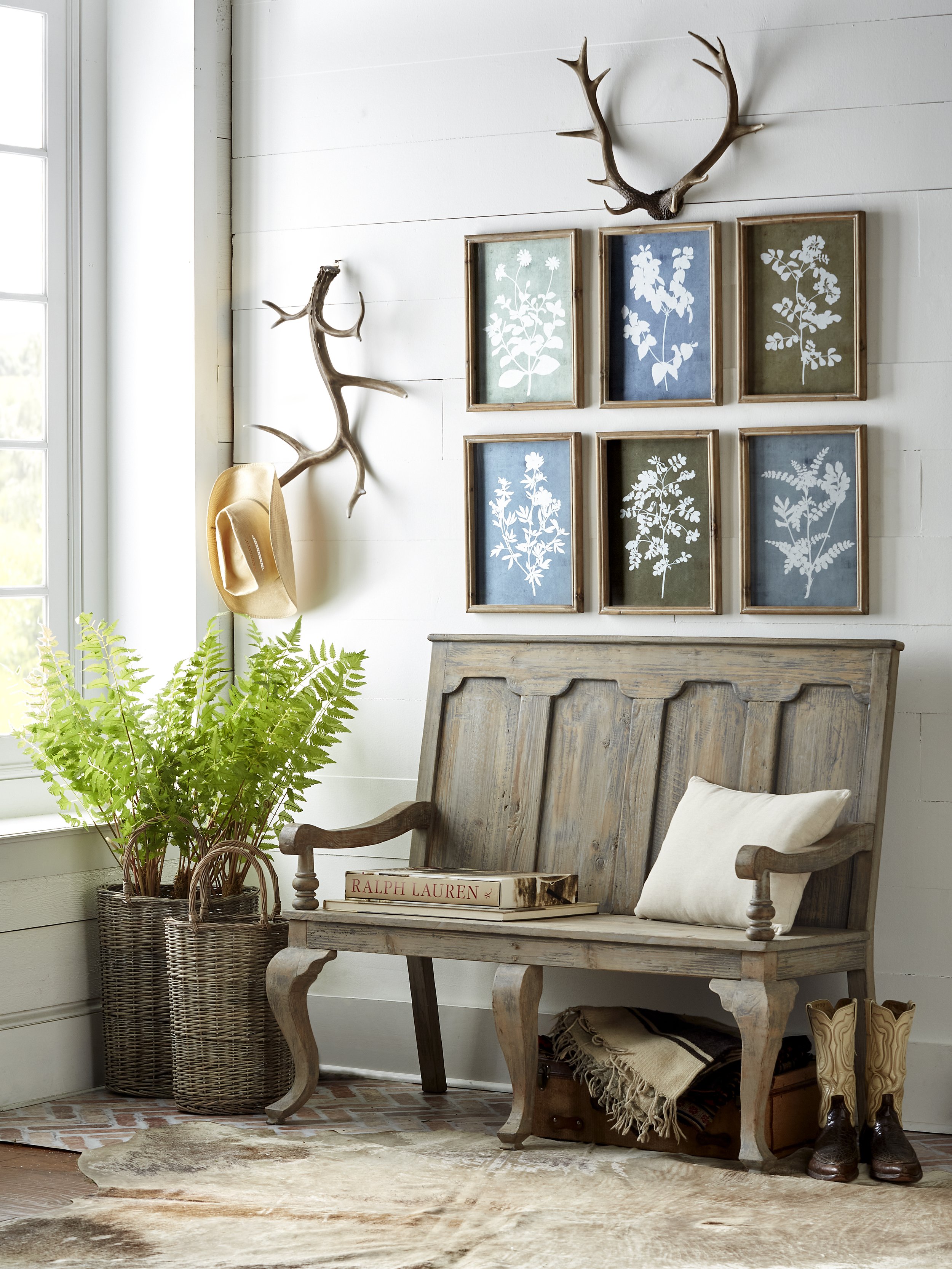 ranch decor, coastal cowgirl decor, wooden bench, antlers, cowhide rug