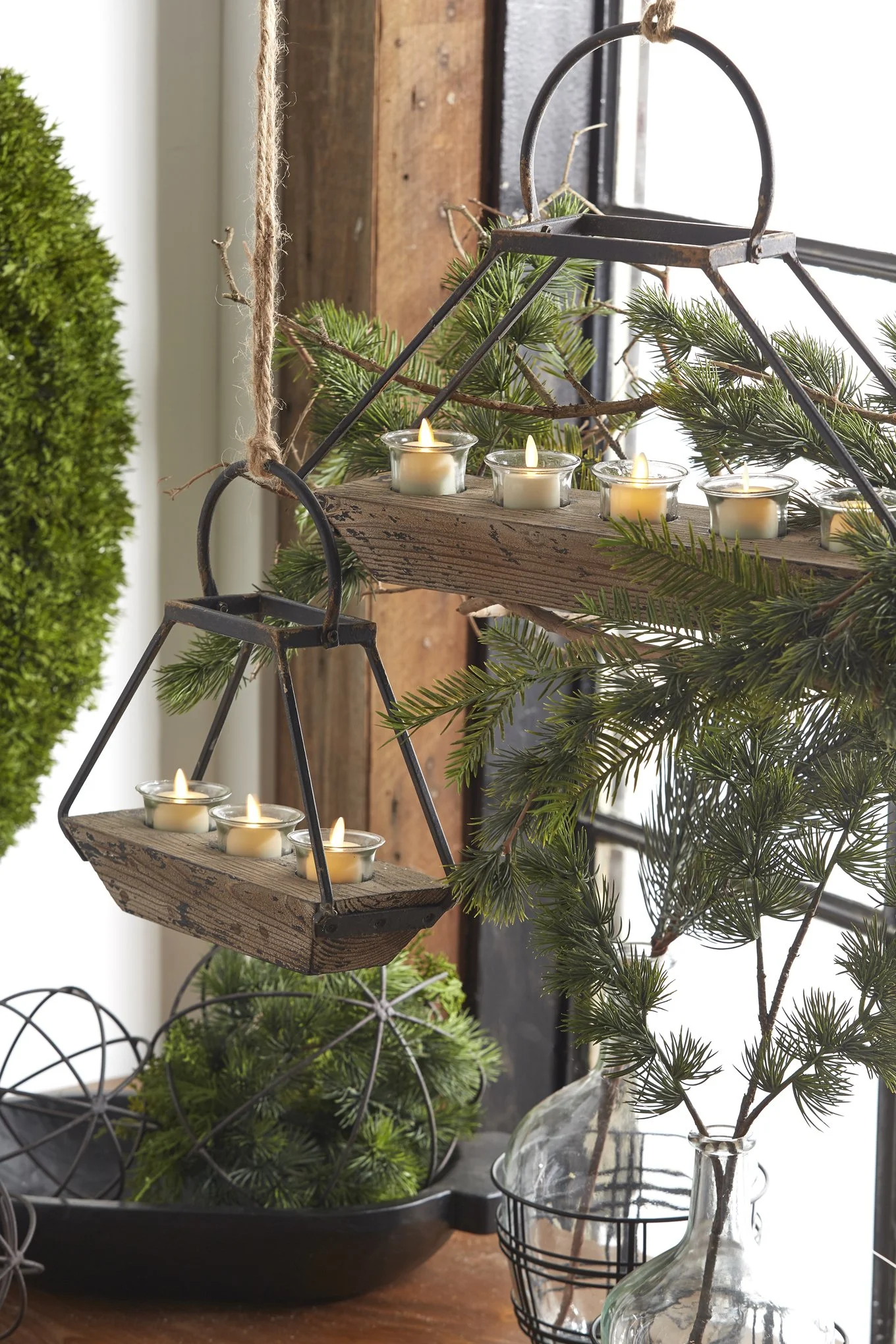 decorating with greenery and candles, hanging candle holders
