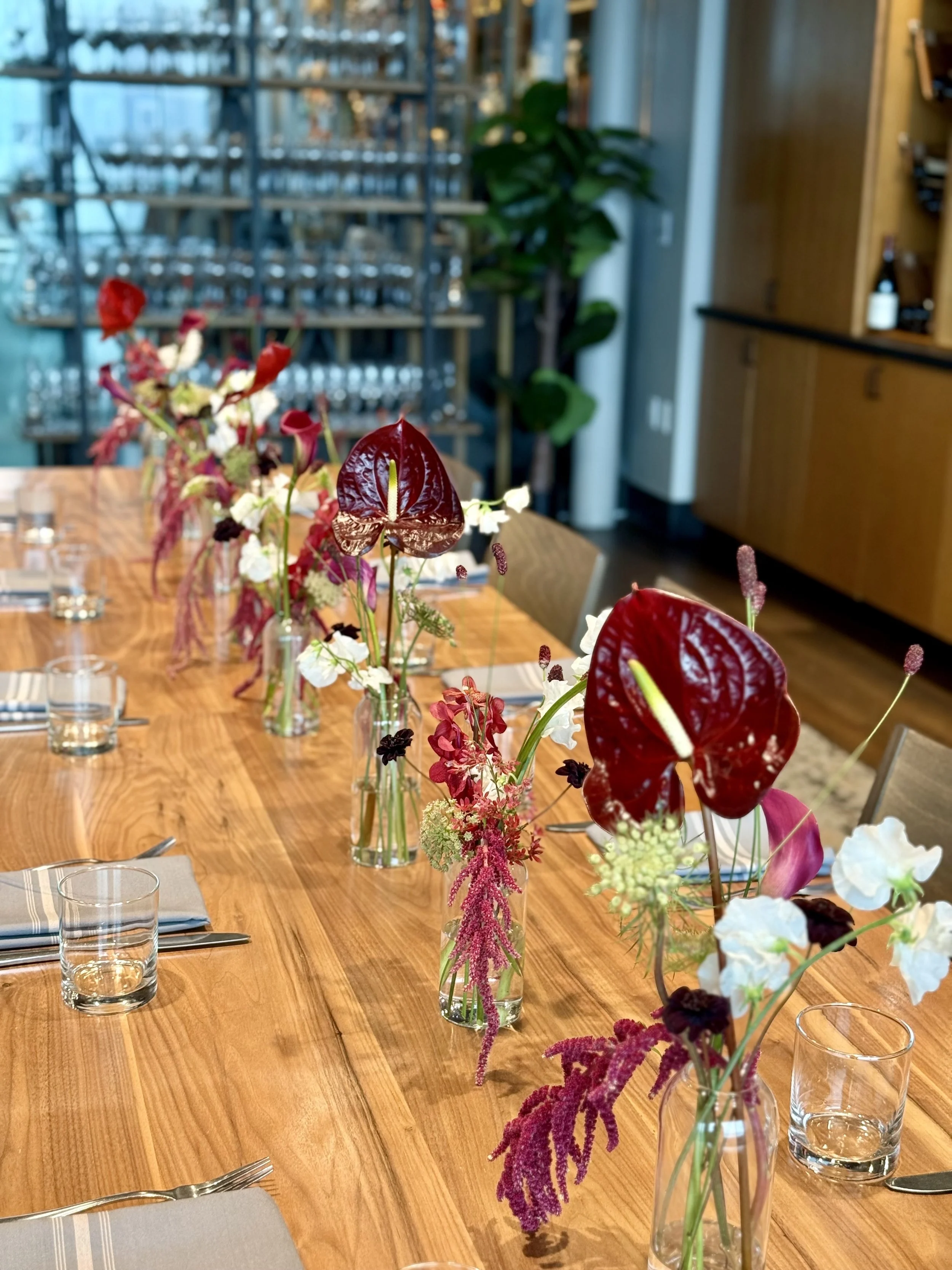 Bud vases for a private corporate dinner