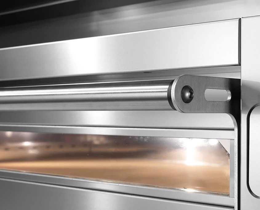 Door with mechanical assist and viewing window