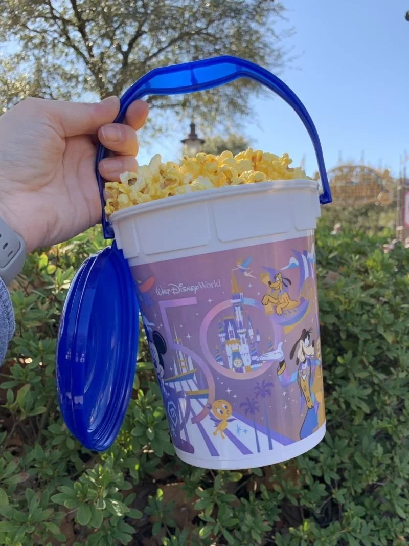 Walt Disney World refillable popcorn bucket filled with popcorn