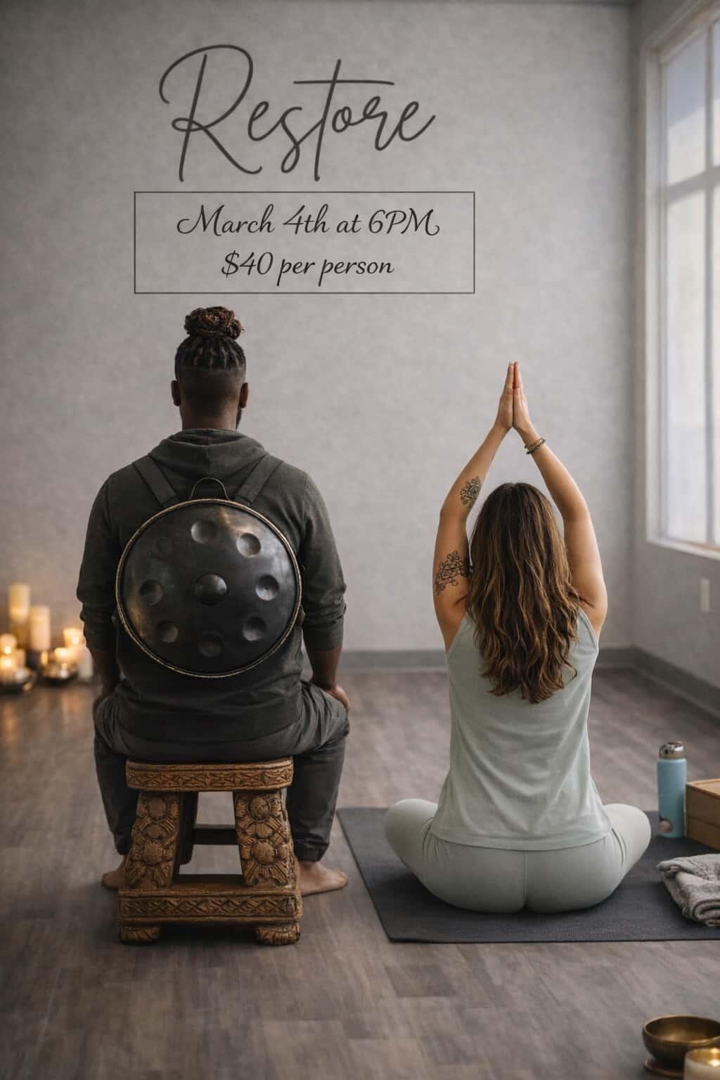 man with handpan sitting with a yoga girl