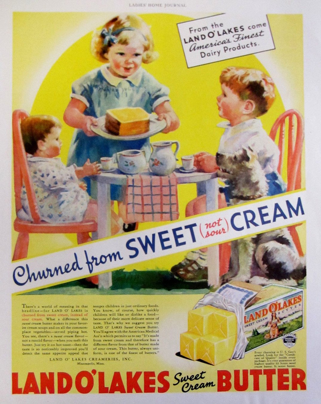 Vintage advertisement featuring children at a tea party, with a large cake and a dog. The ad promotes Land O'Lakes sweet cream butter with the slogan 'Churned from sweet (not sour) cream.'