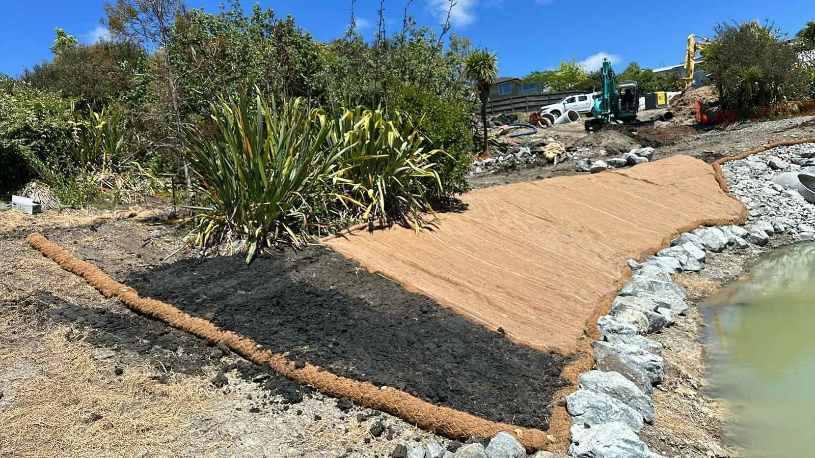 Glasgow Contractors Pond Renewal Planting Rock Armour Toe Protection.JPEG