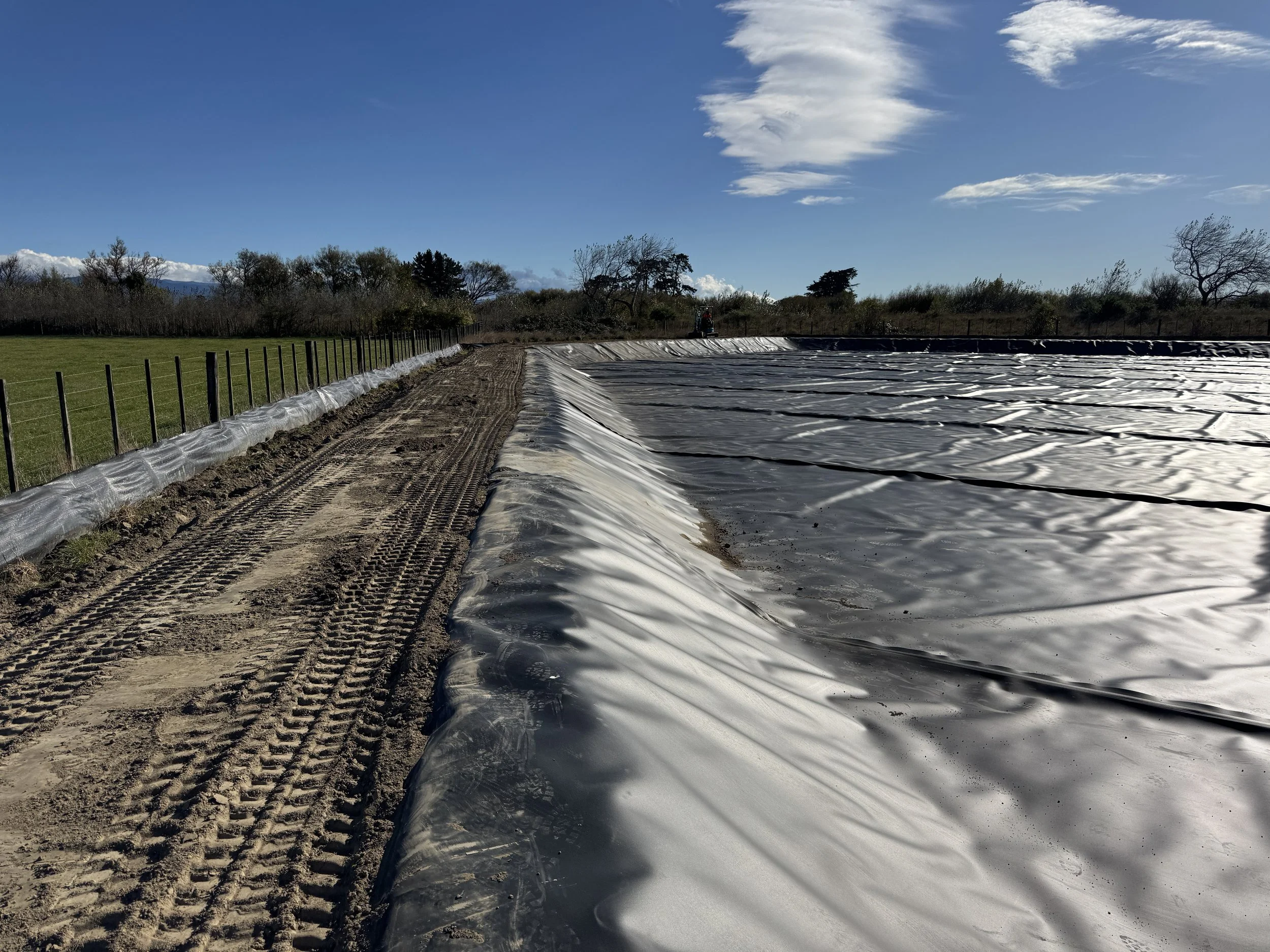 HDPE Lined Dewatering Basin Construction.JPG