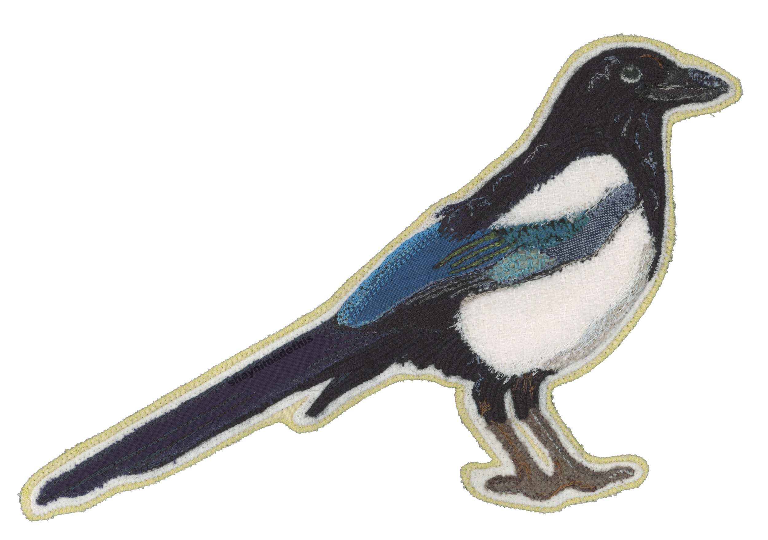 Magpie applique patch w/free motion embroidery and couched yarn for feathers. 12/5/25