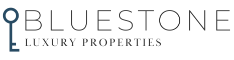 Bluestone Luxury Properties logo with a key icon.