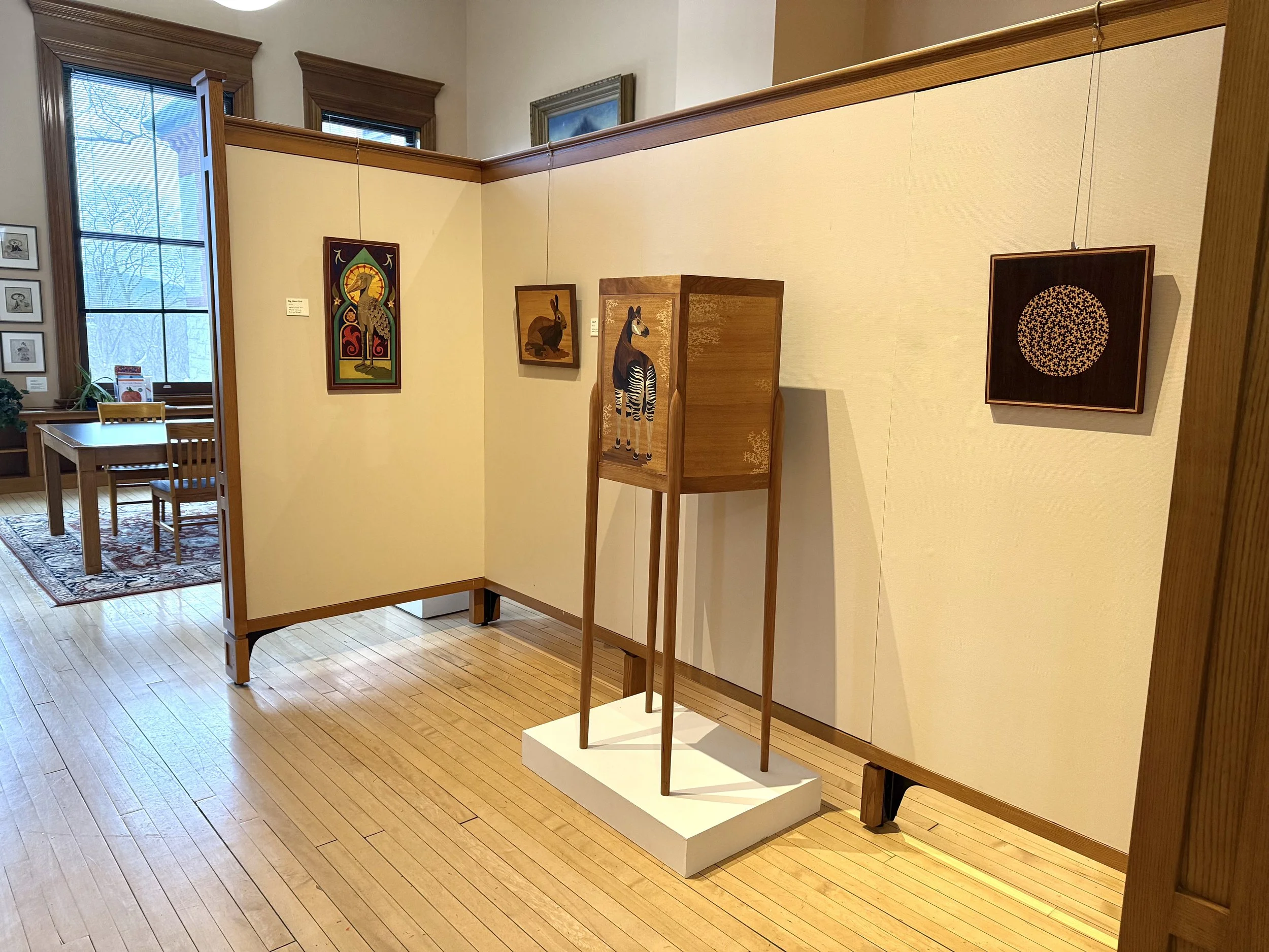 Photo of the gallery space at the Hosmer Gallery with some of my marquetry pieces on display