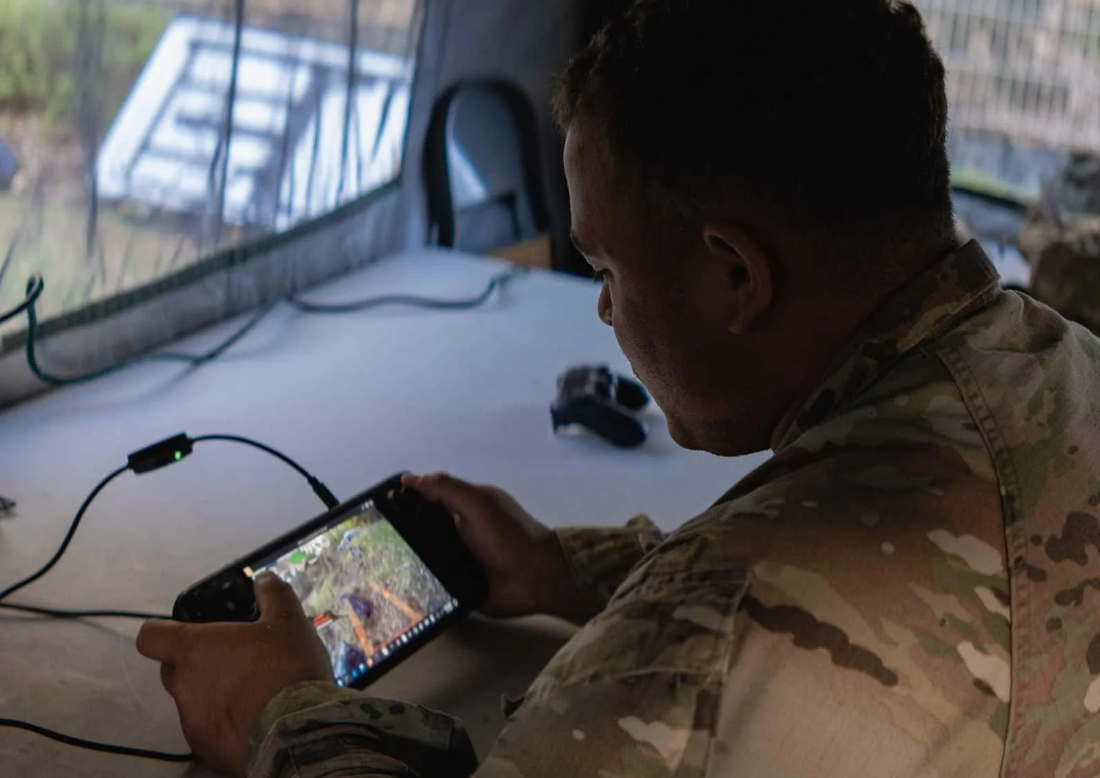 User controlling Stridar's Siderunner UAV remotely using a game controller.