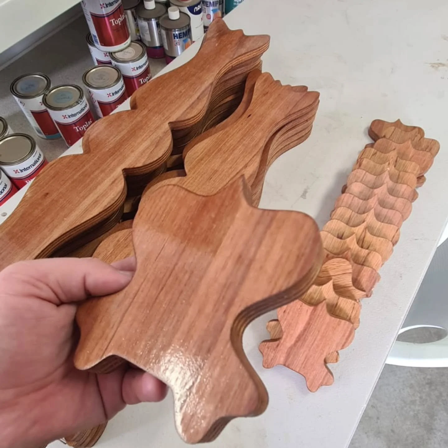 Ornamental period house trims in marine plywood with epoxy sealing coat.