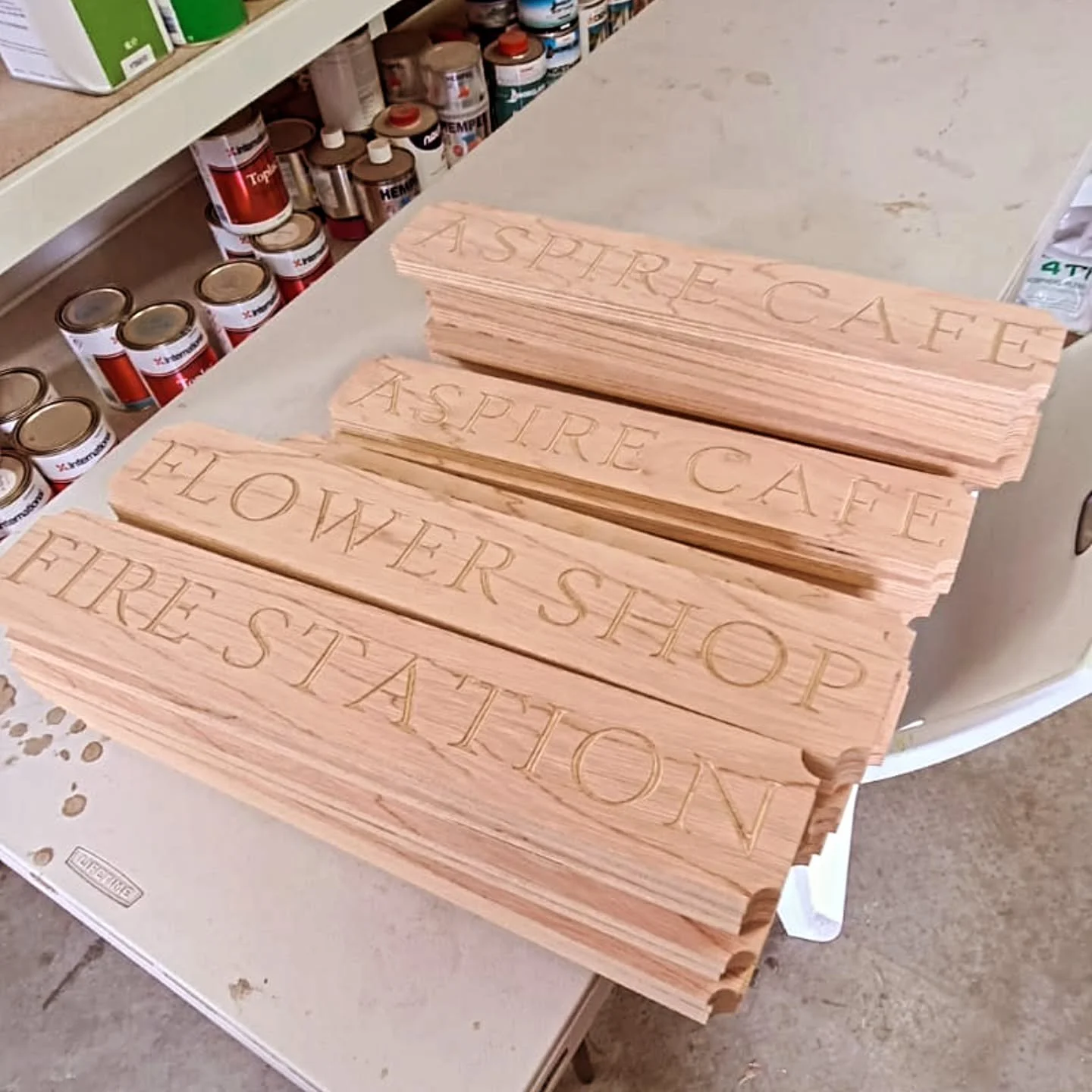 Custom play signs in marine plywood.