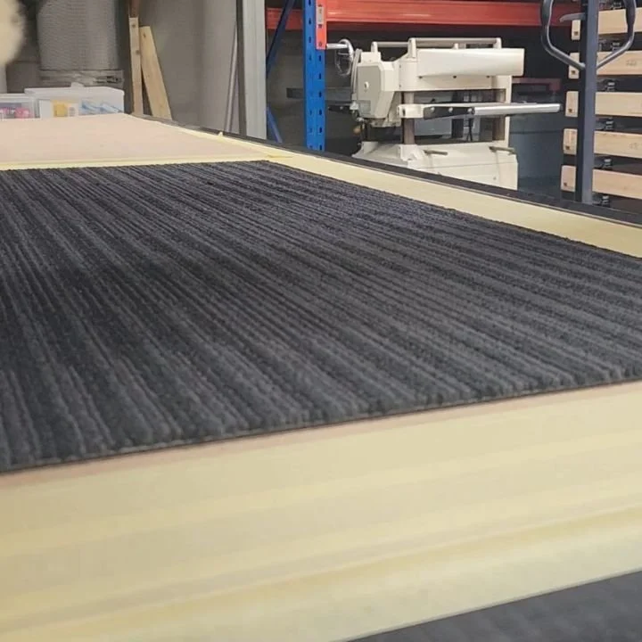 Turns out I can cut bitumen carpet tiles. Took a bit to get right, worth it for the 100x we had to cut....

#CNCcutting  #customcarpet