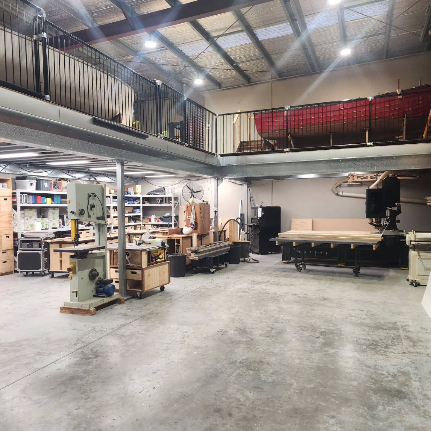 New mezzanine. Big thanks to the old man for flying down to build this sucker with us. What a powerhouse, 10 day build while still open. Big thanks to compacked for engineering and supplying the kit.

Now we have room to move and build.