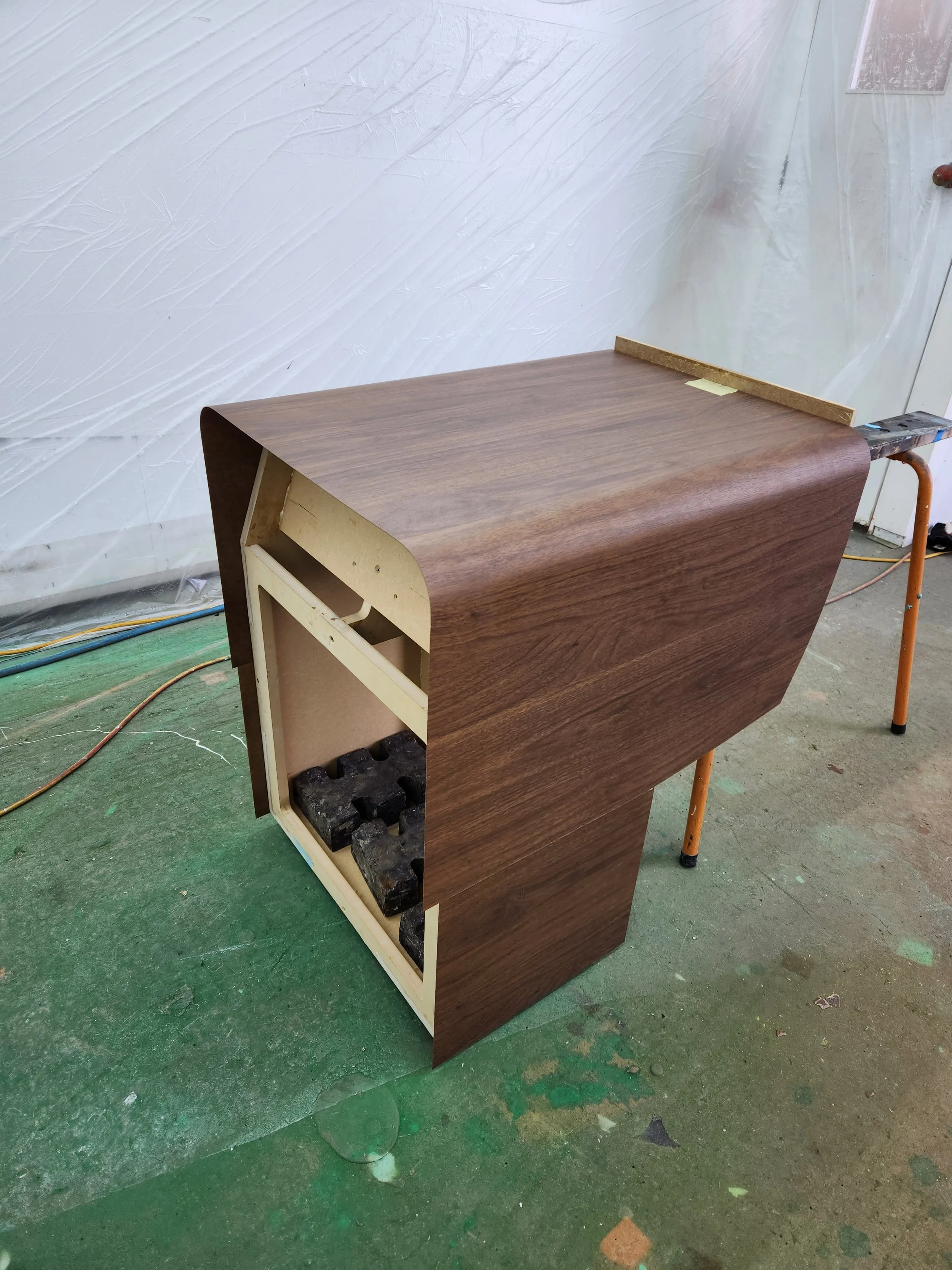 Custom laminate veneered curved console unit for interative display at Highpoint Shopping Centre.