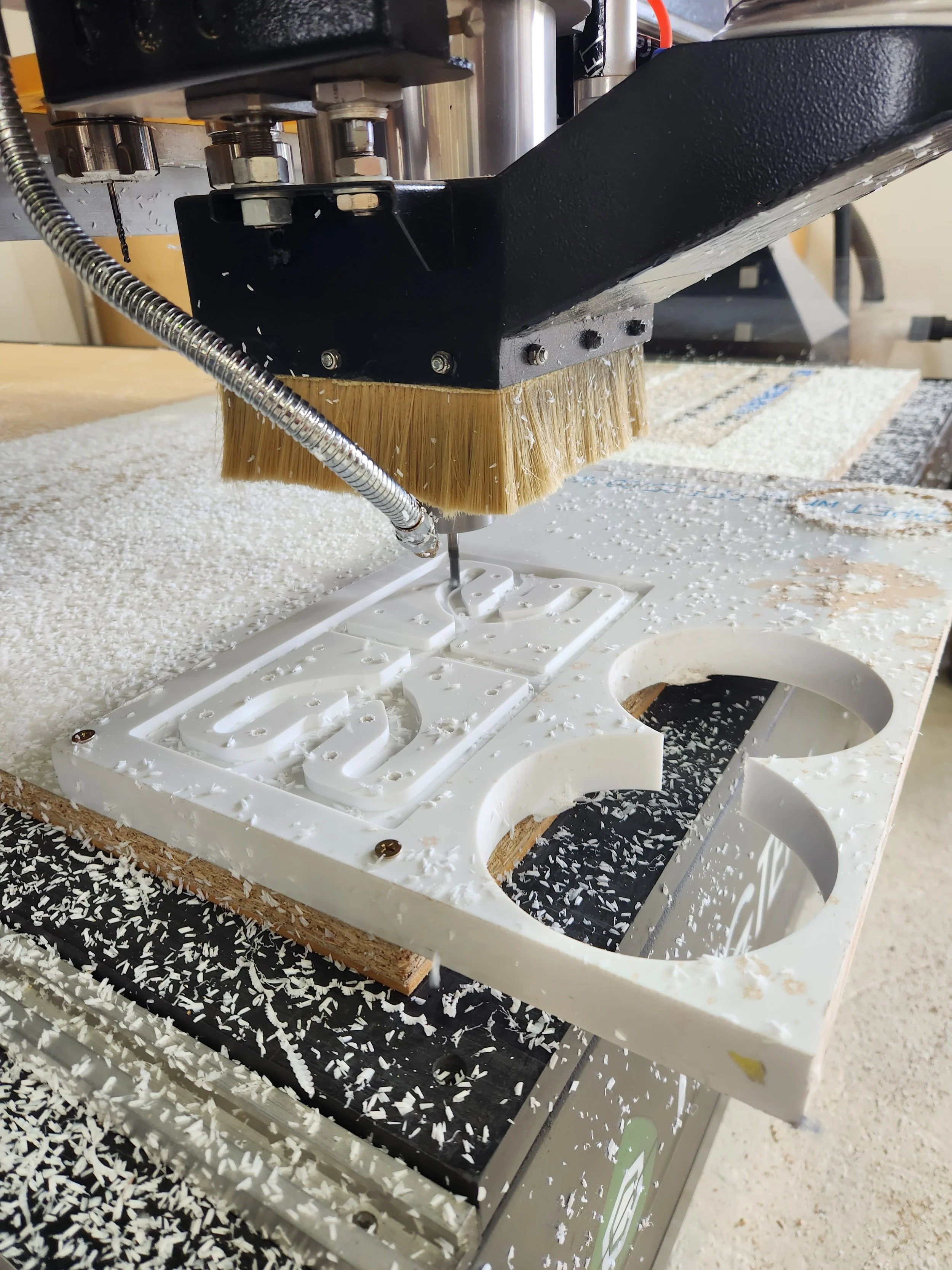 CNC Cutting NYLON block for custom removable hatch.