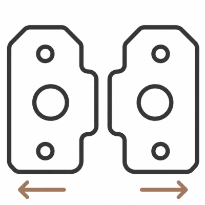 Two symmetrical door hinges with a measurement arrow indicating their width.