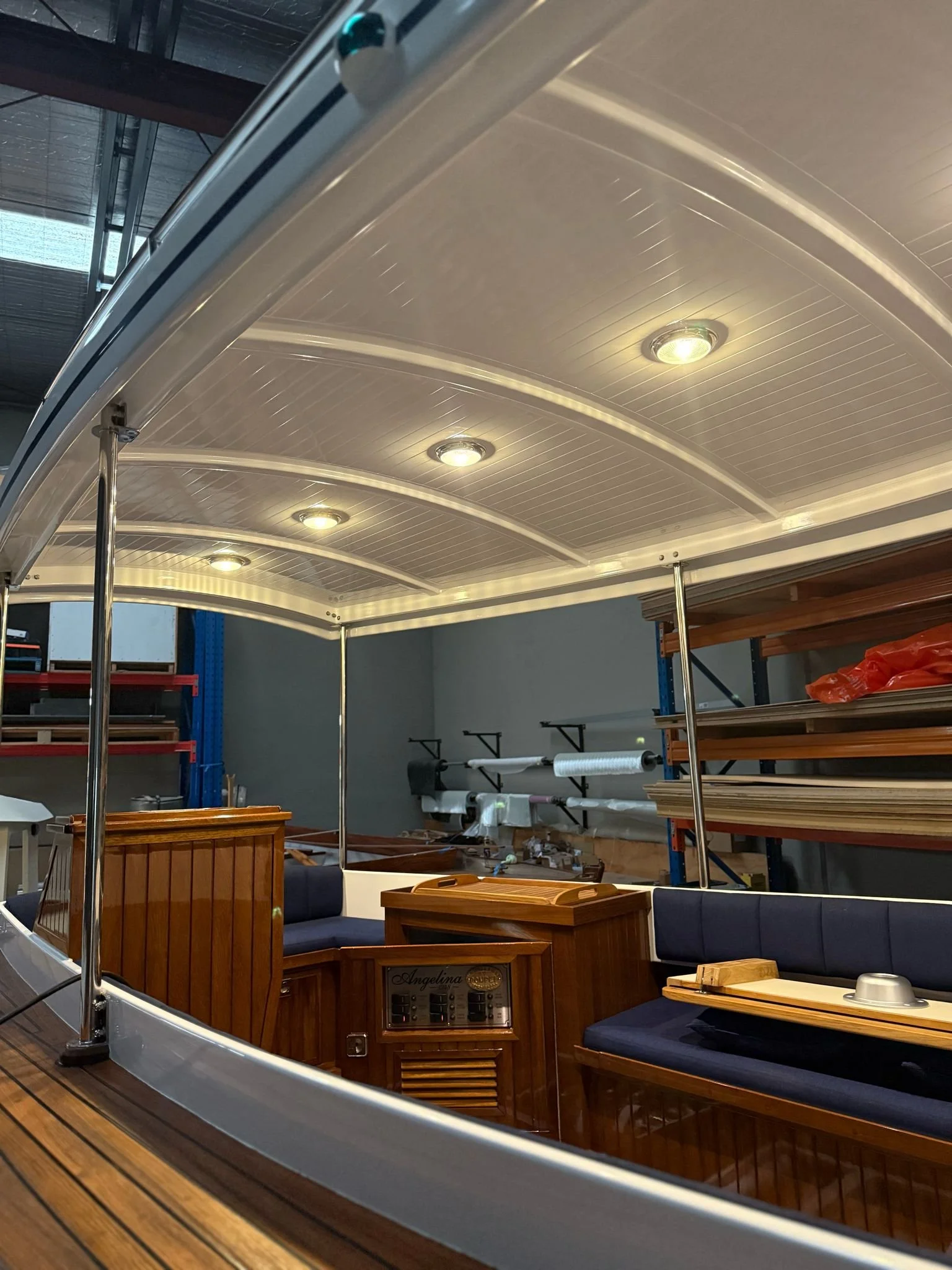 Pompei custom boat restoration, custom teak interior with varnish and custom foam core composite roof with solar.