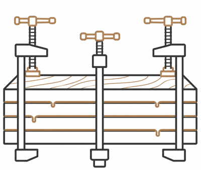 Three clamps attached to a wooden board.