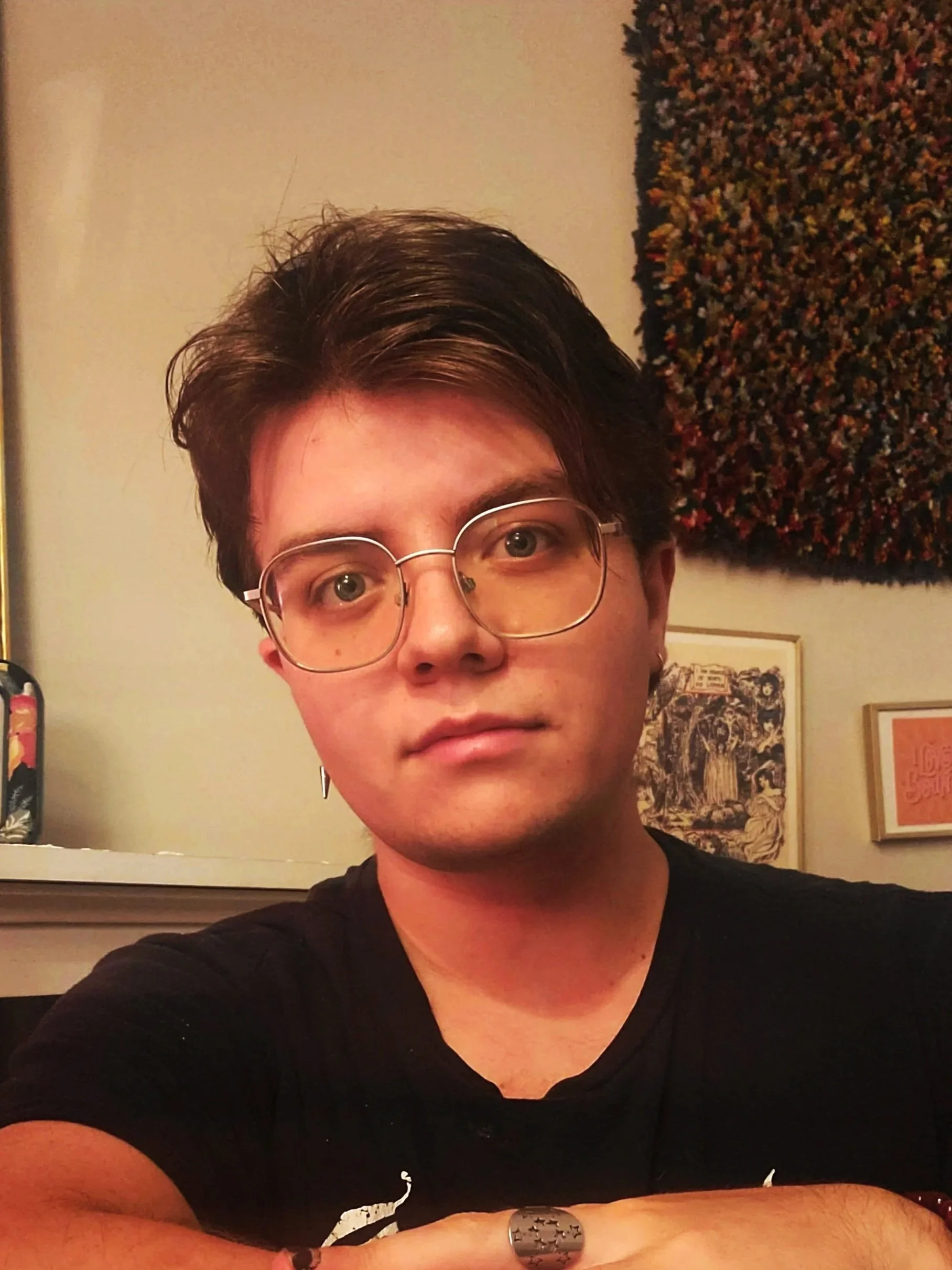 Theodore Venema, a young man wearing glasses.