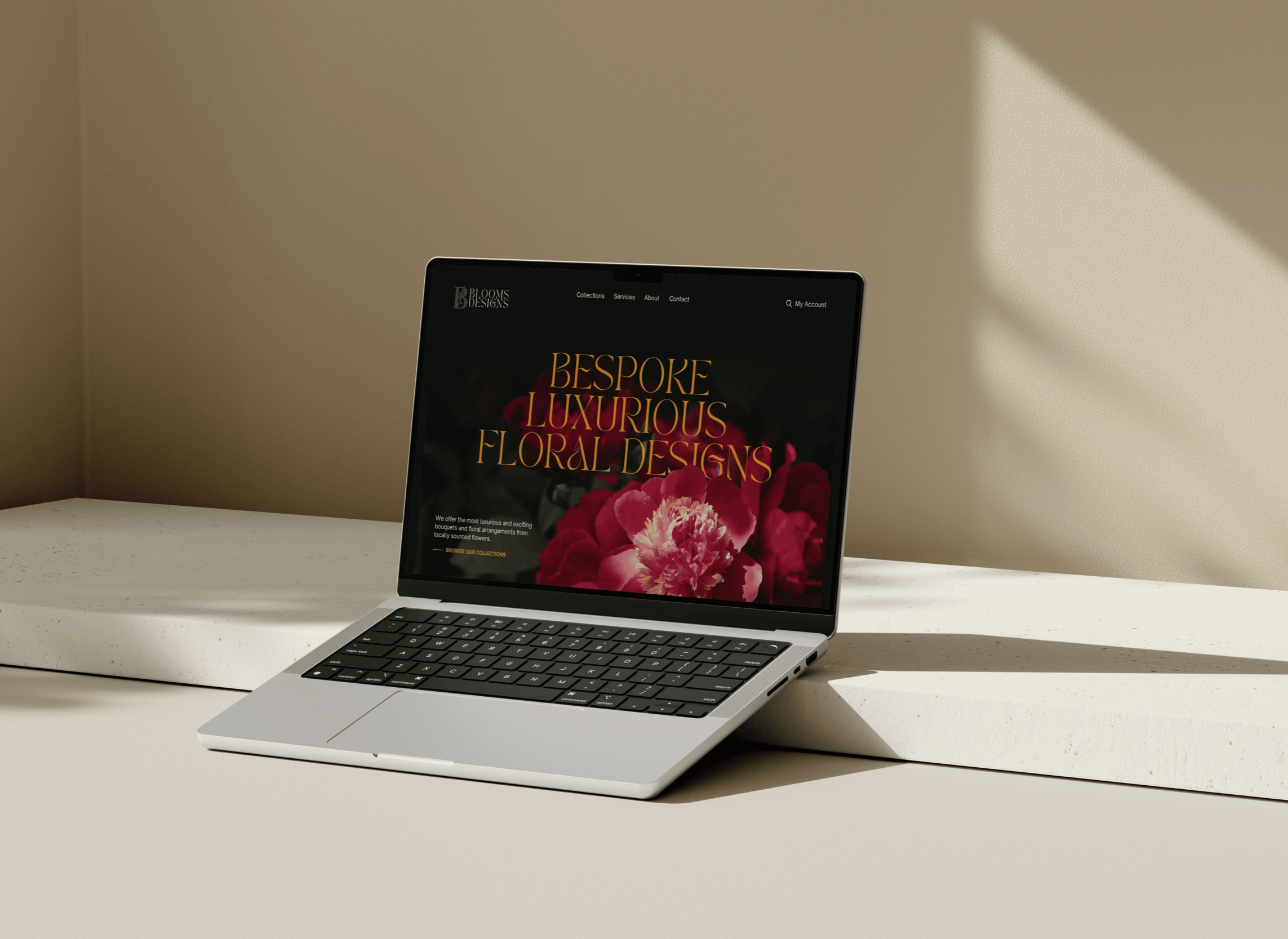 Custom floral website design displayed on a laptop mockup