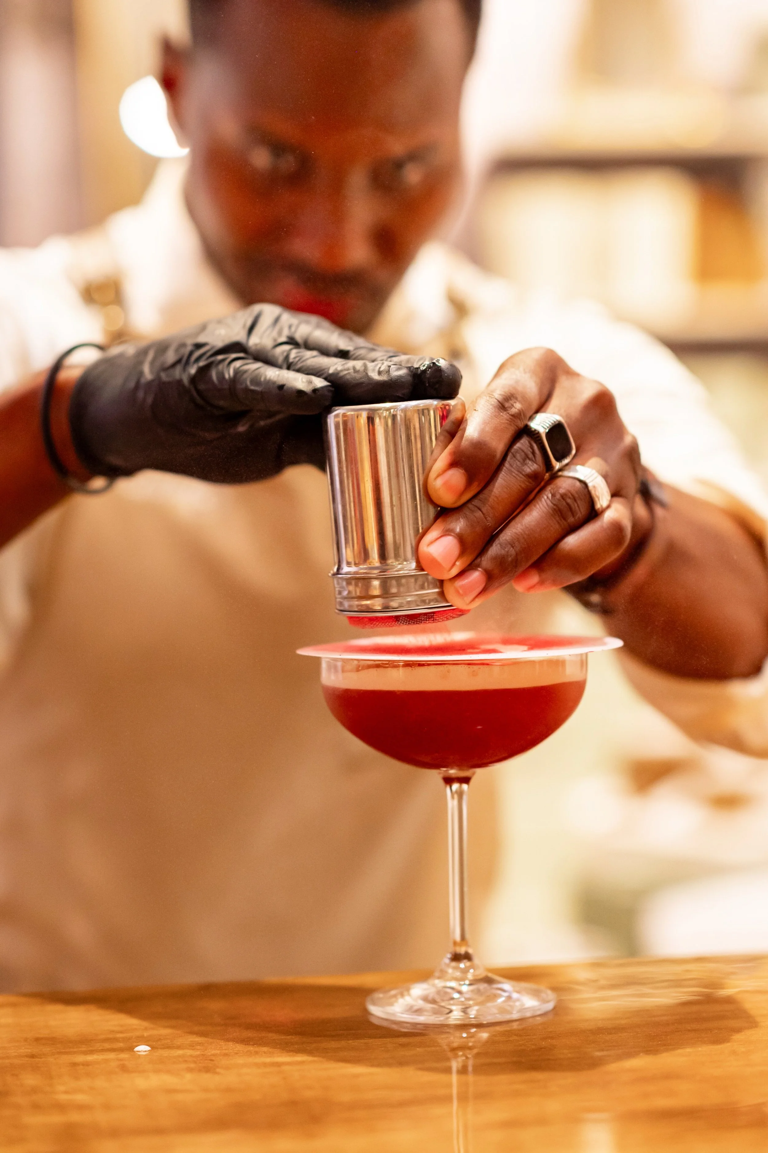 Mobile bartender preparing craft cocktails for private event.