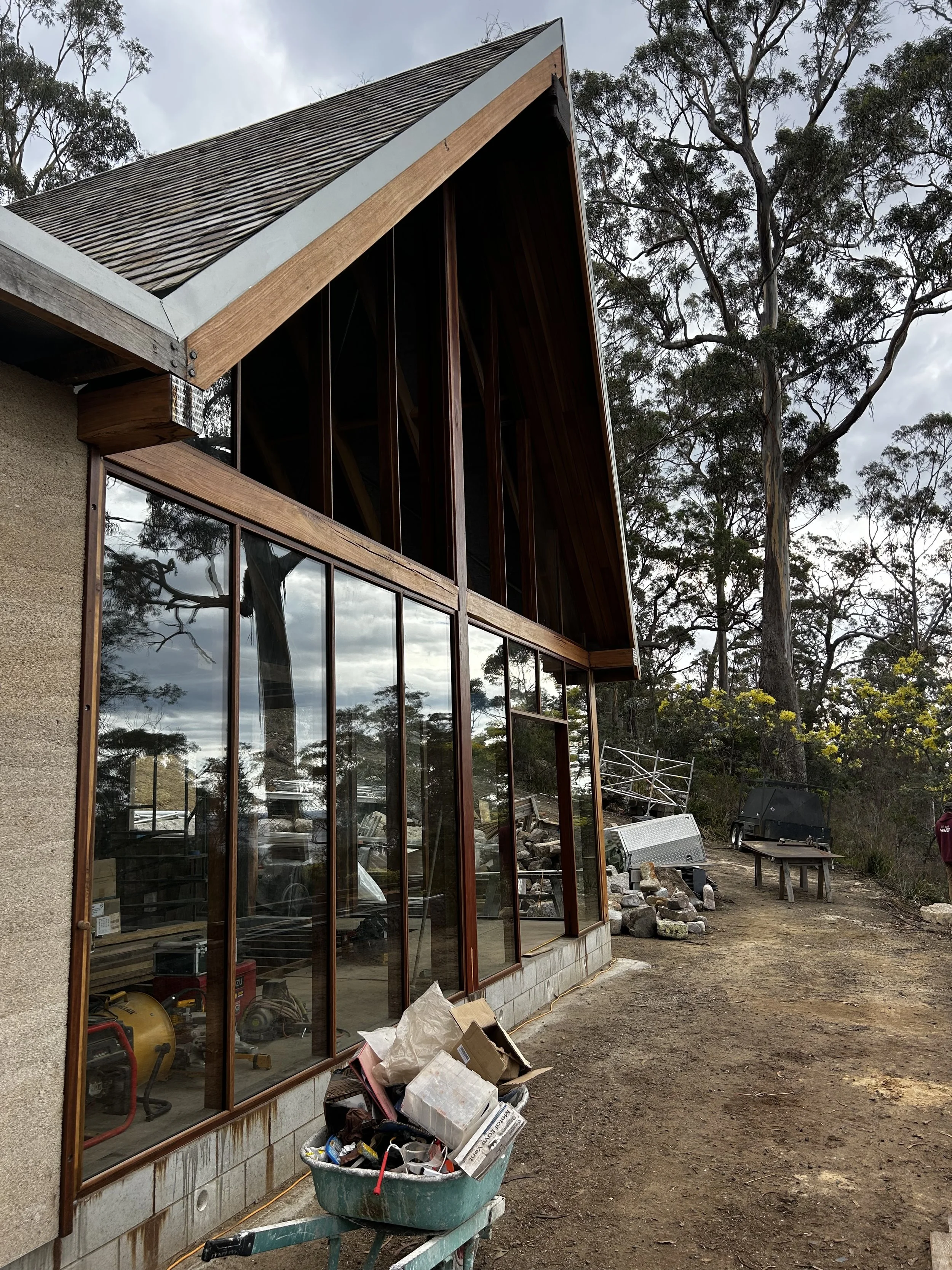 Bicheno Bushbuck. Construction progress. Spotted gum facade installed. Double glazed Bushfire rated