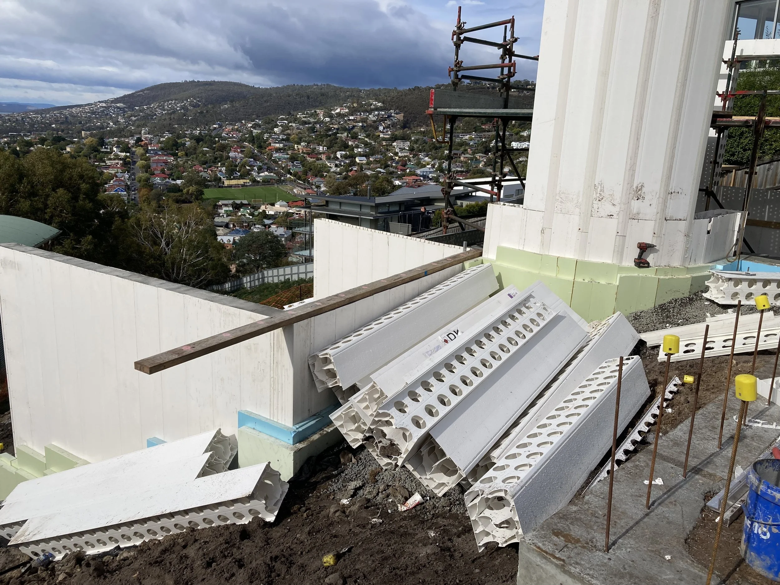 Hobart Hills CLT House. Site construction progress showing Dincel wall installation
