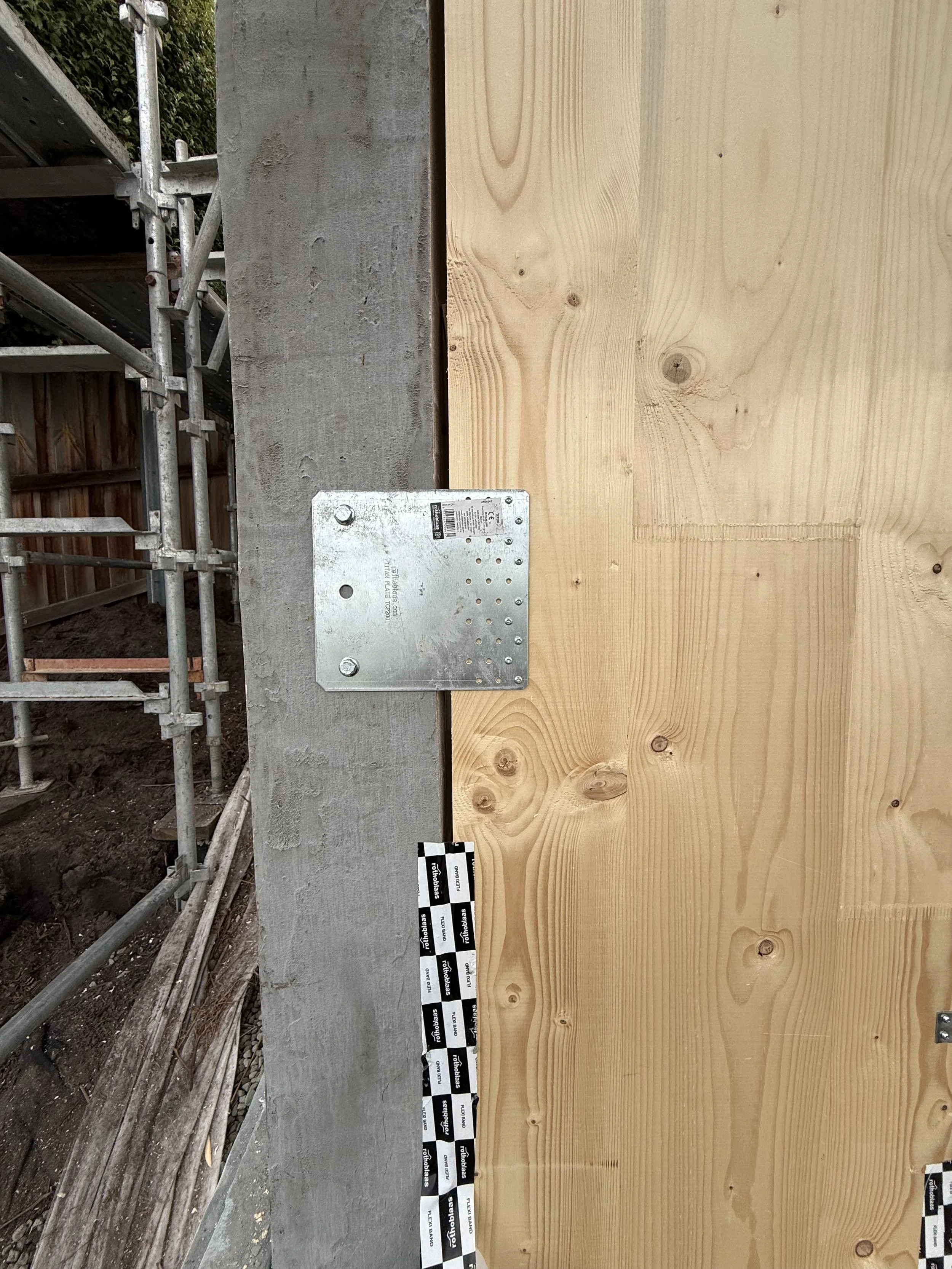 Hobart Hills CLT House. Site construction progress showing CLT mass timber and Dincel plate connection by Loubser Workshop