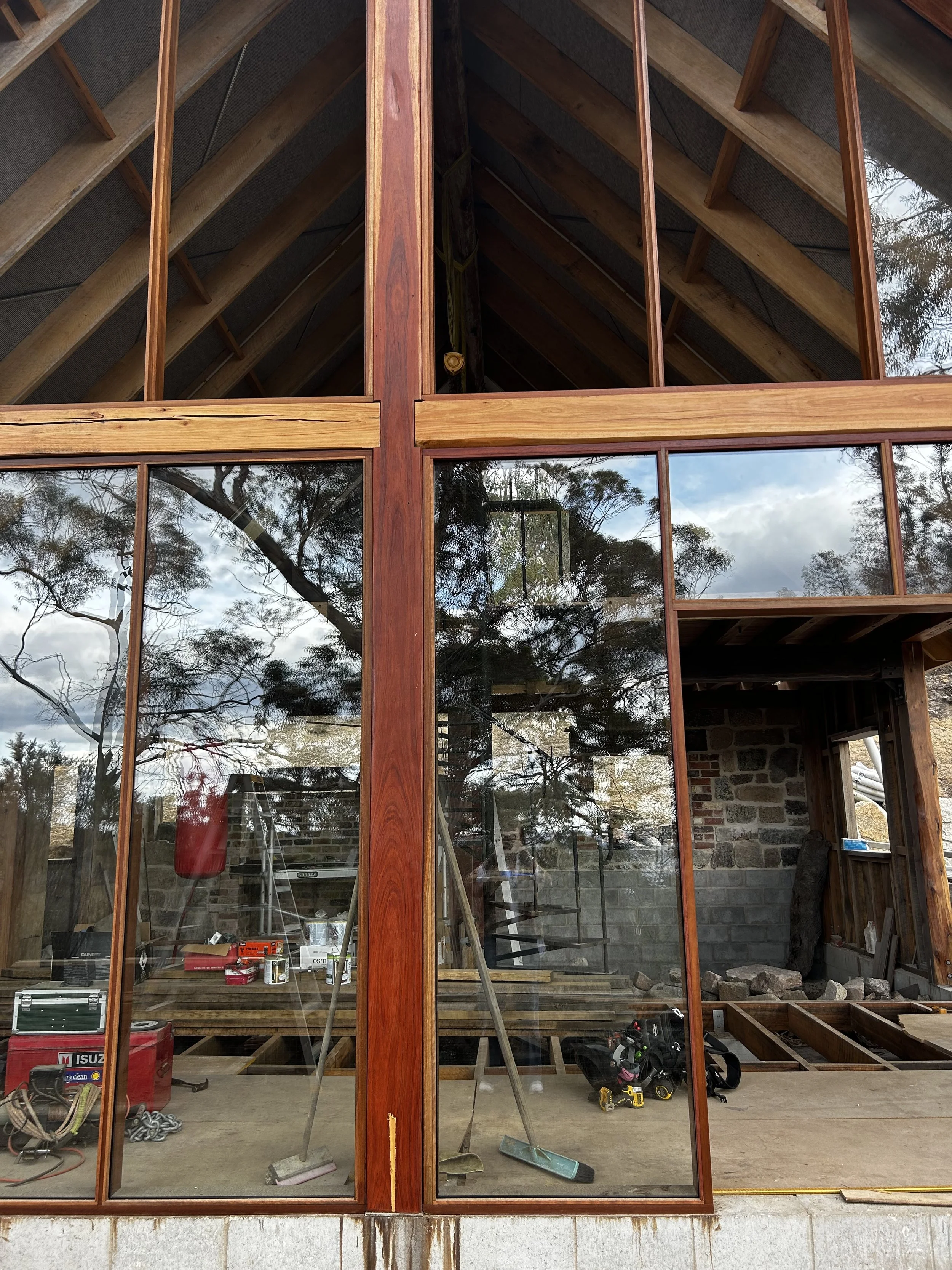 Bicheno Bushbuck. Construction progress. Spotted gum facade installed. Double glazed Bushfire rated