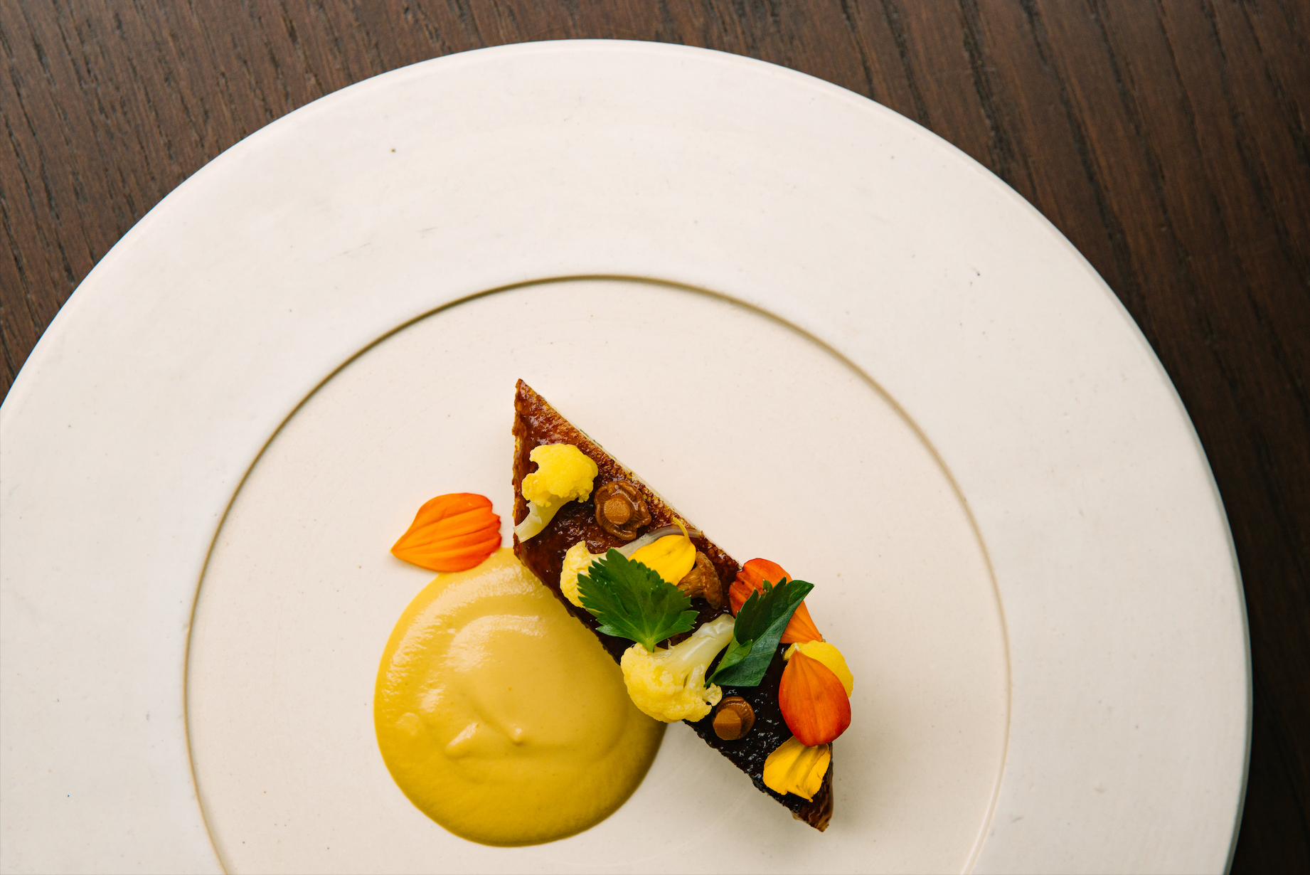 CUE MERGES TWO WORLDS INTO ONE EXPERIENCE