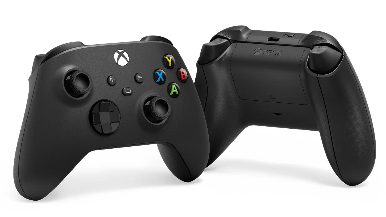 Two black Xbox wireless controllers. One is shown from the front, displaying buttons and joysticks, and the other from the back, highlighting its design.