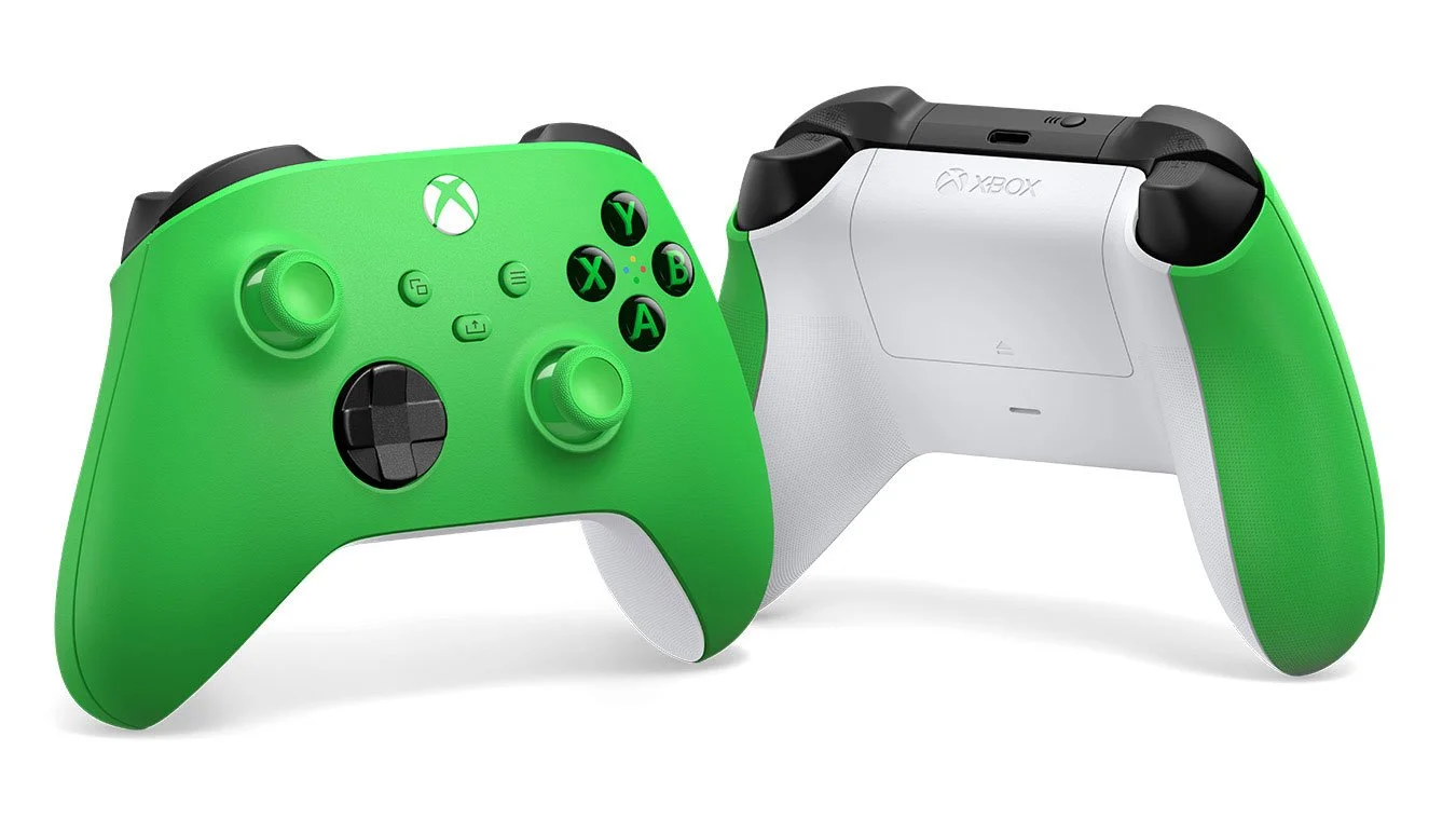 Green and white Xbox wireless controllers on a white background.