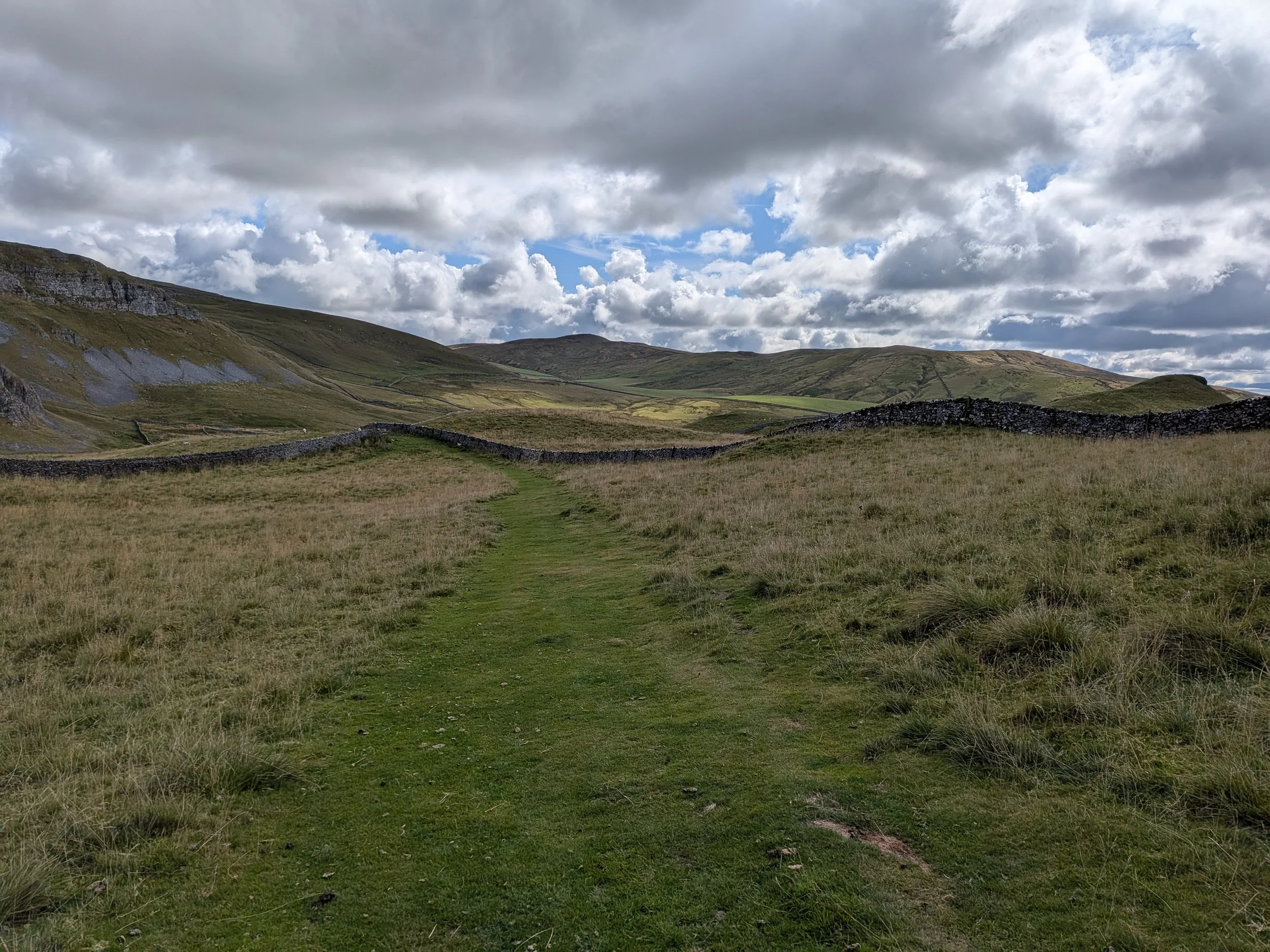 Yorkshire Dales landscape with hills and stone walls