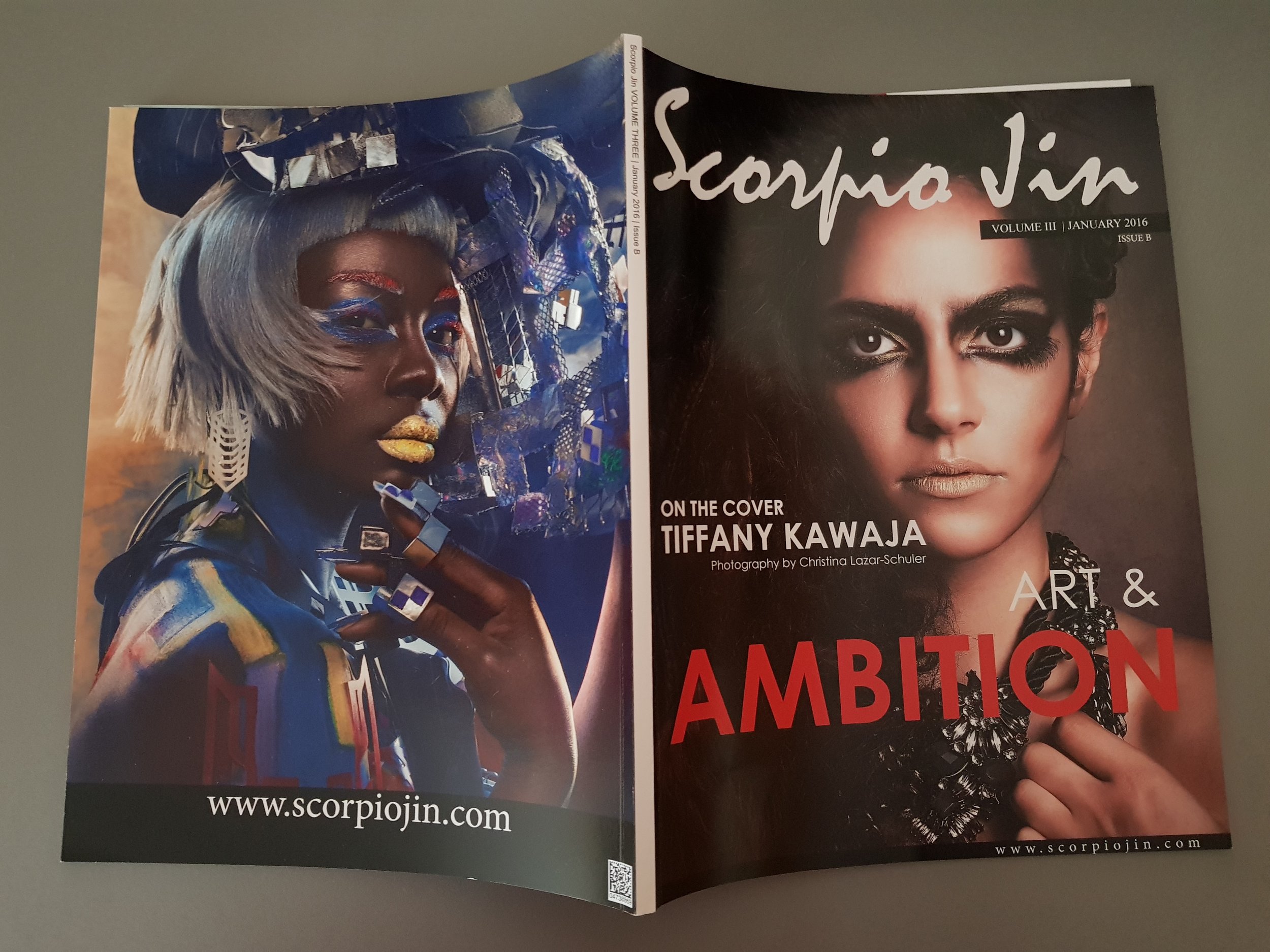 Two-page magazine spread featuring a model with elaborate makeup and hair styling on the left, and a close-up portrait of Tiffany Kawaja on the right with a dark background and text about Art & Ambition.