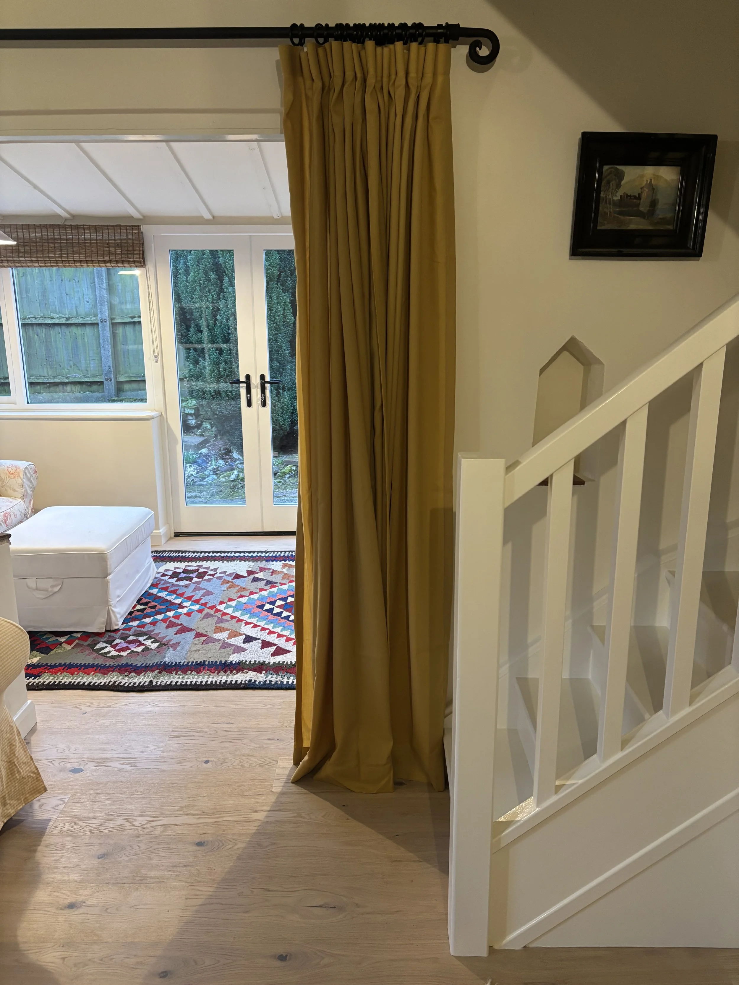 Stairs with a golden curtain