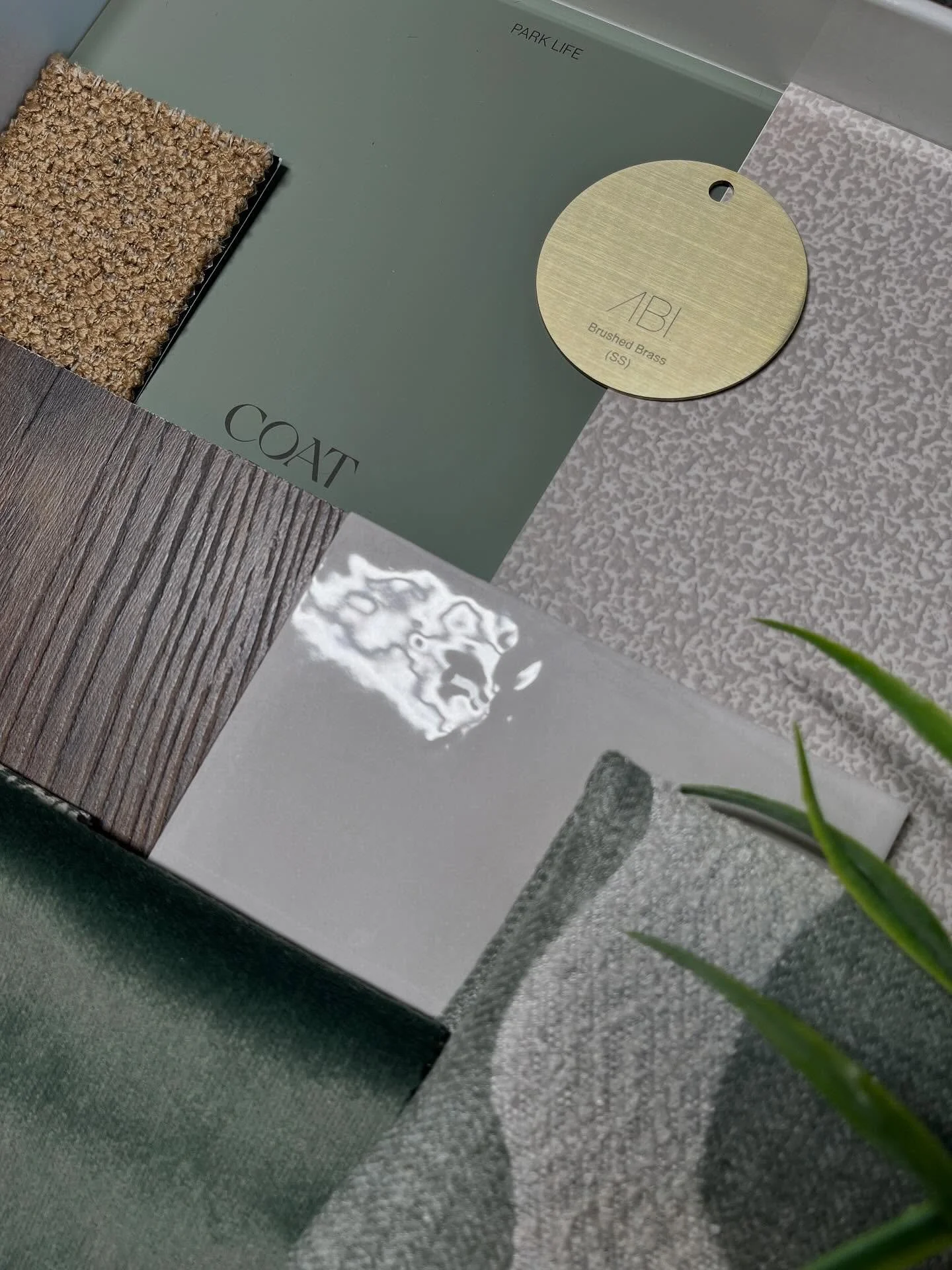 My current October colour crush is Park Life by COAT Paints, a grounded nature-inspired green that feels like a walk through crisp air and turning leaves.

Paired with dark wood, brass accents, and a textured wall covering from Omexo, it balances war