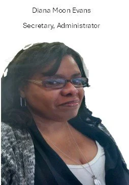 Portrait of Diana Moon Evans, Secretary and Administrator, with dark hair, glasses, and earrings, wearing a striped top and a dark cardigan.