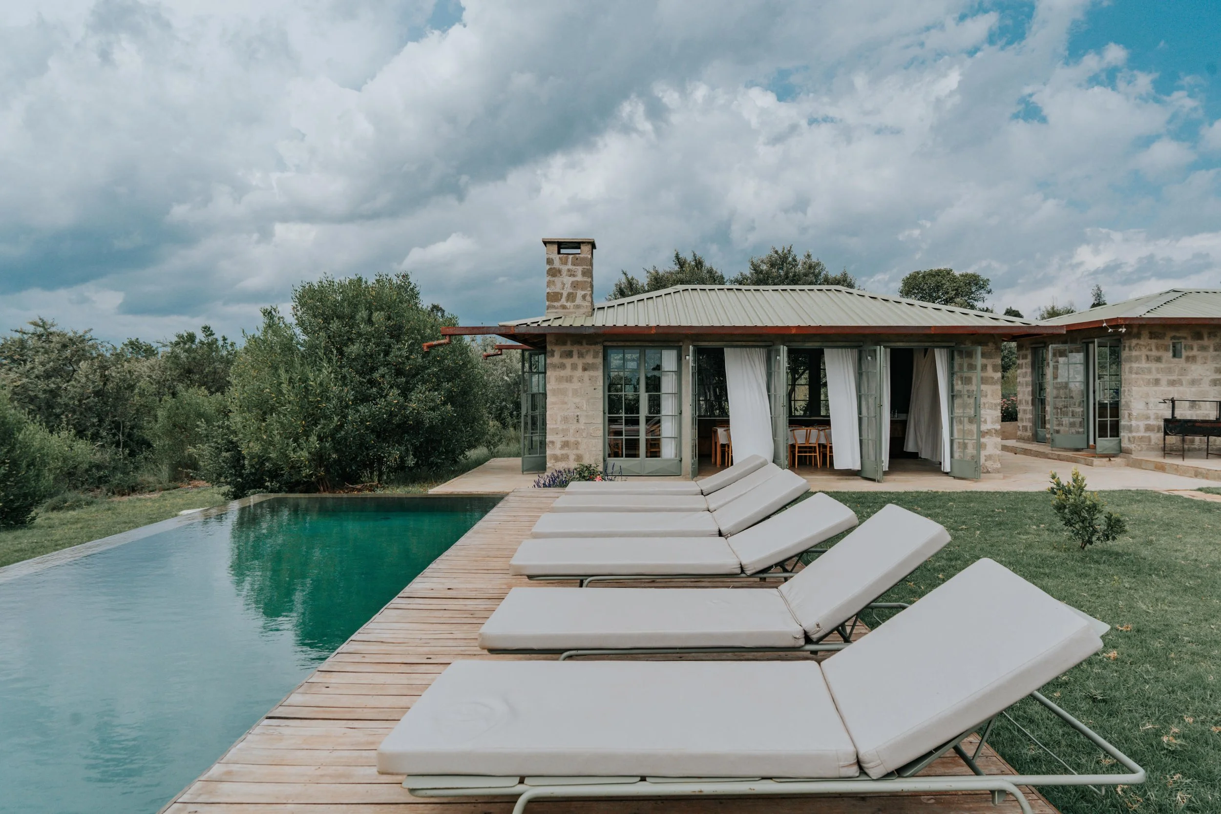 Pool deck with sun loungers
