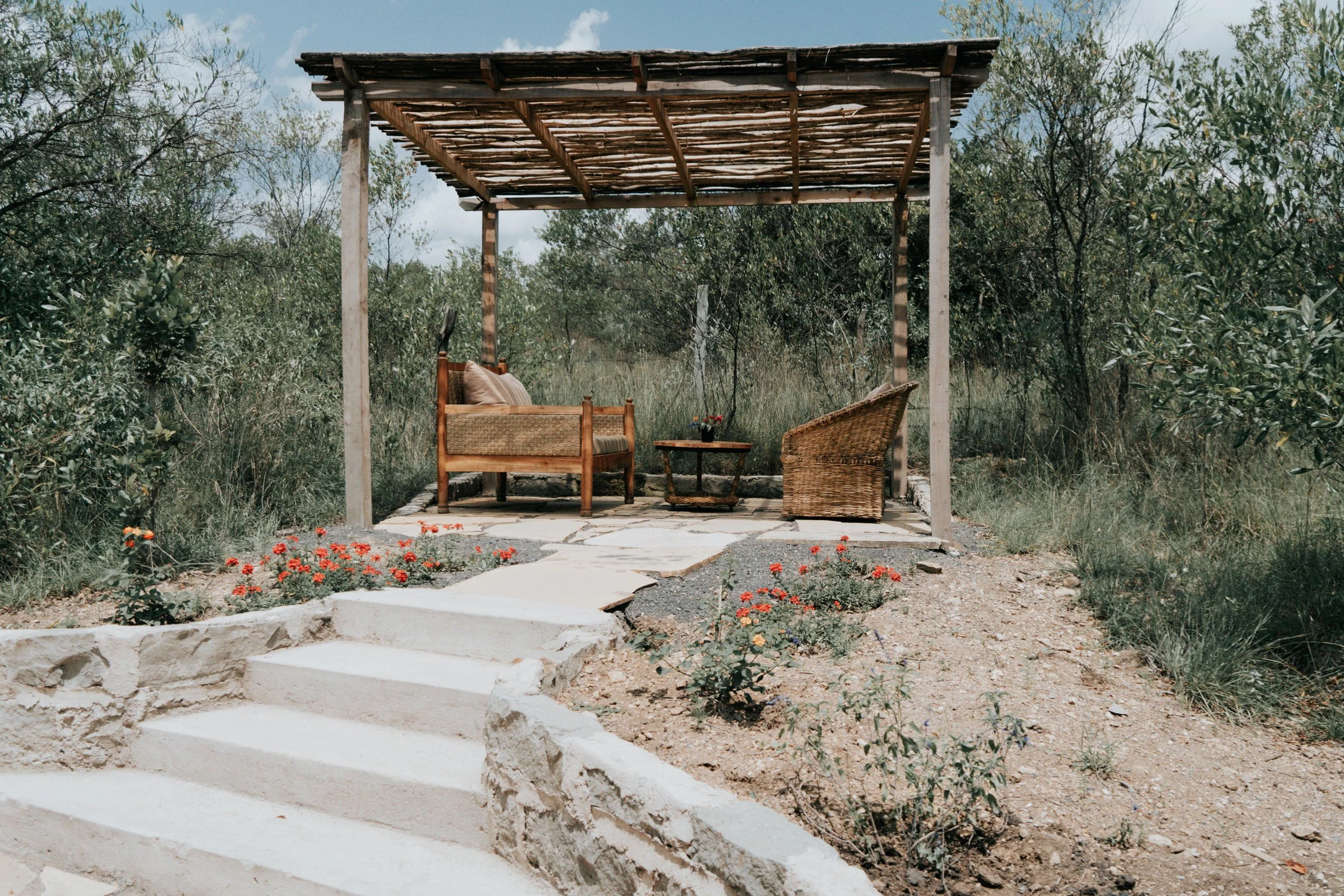 Garden pergola with lounge furniture