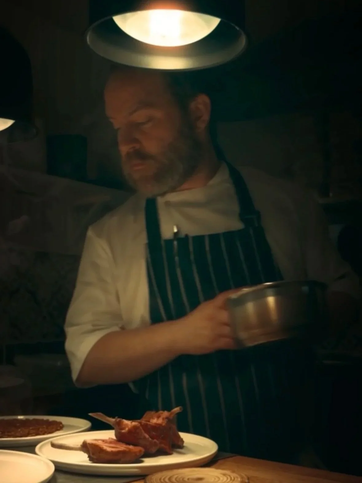 Chef Preparing our Signature Lamb dish in our Little restaurant in Islington