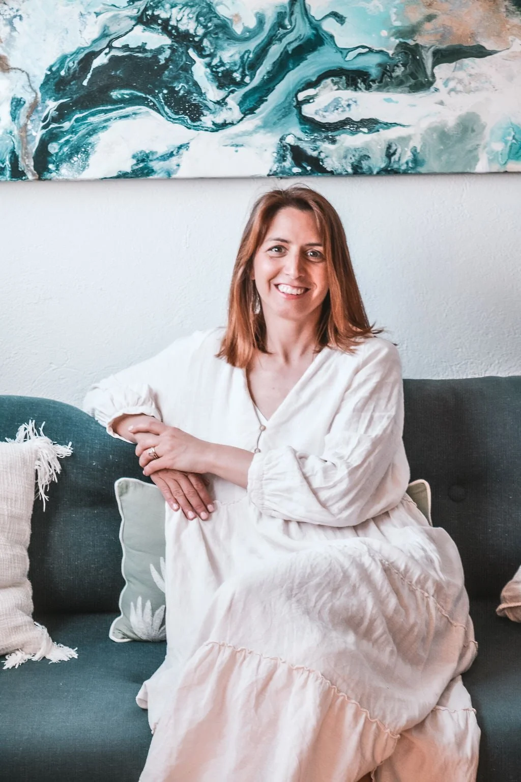 Denise Wolf, psychotherapist in Ibiza, sitting in her therapy room