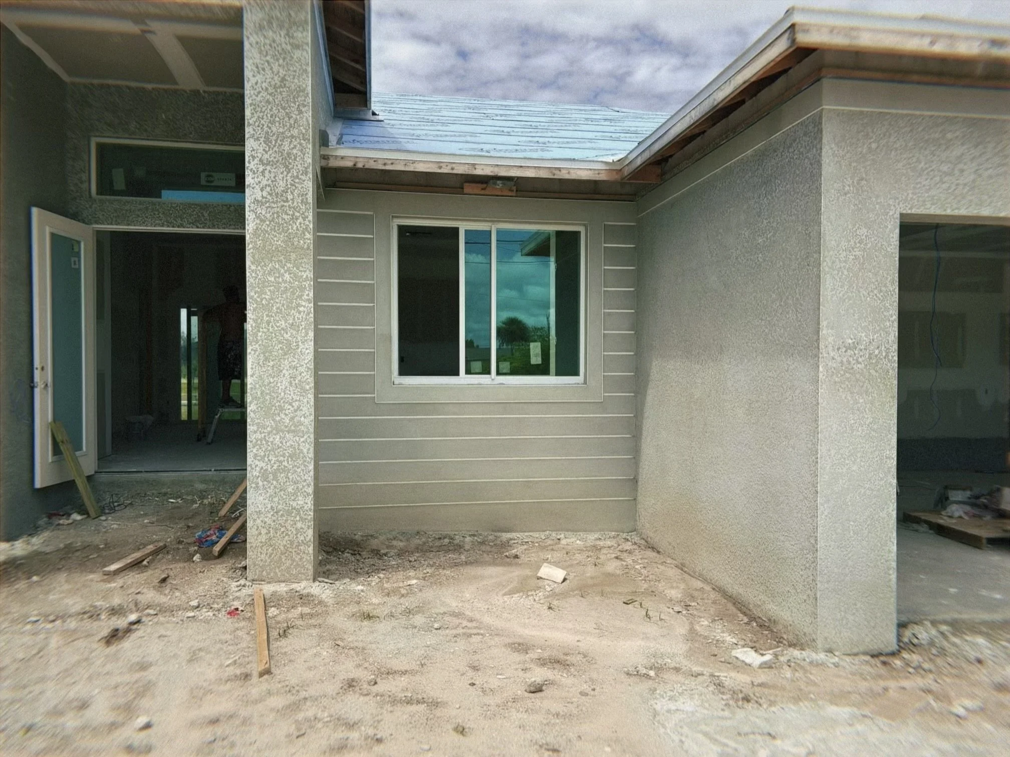 Lath and stucco on a SWFL home. Lap siding look.