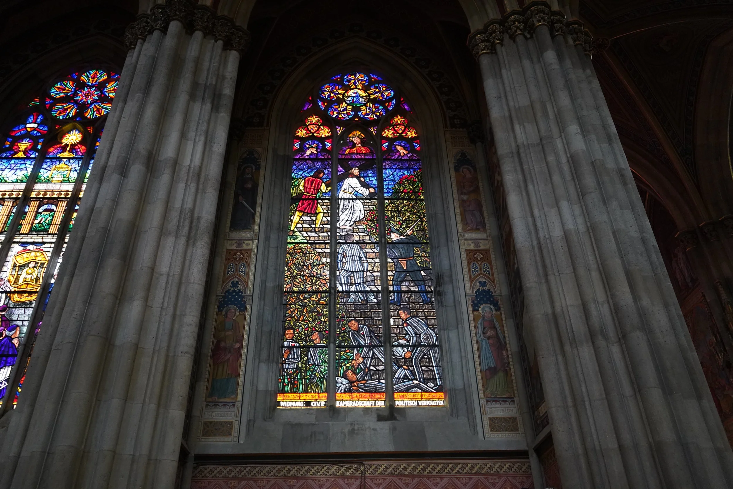 Some of the stained glass windows depict scenes from the Holocaust 
