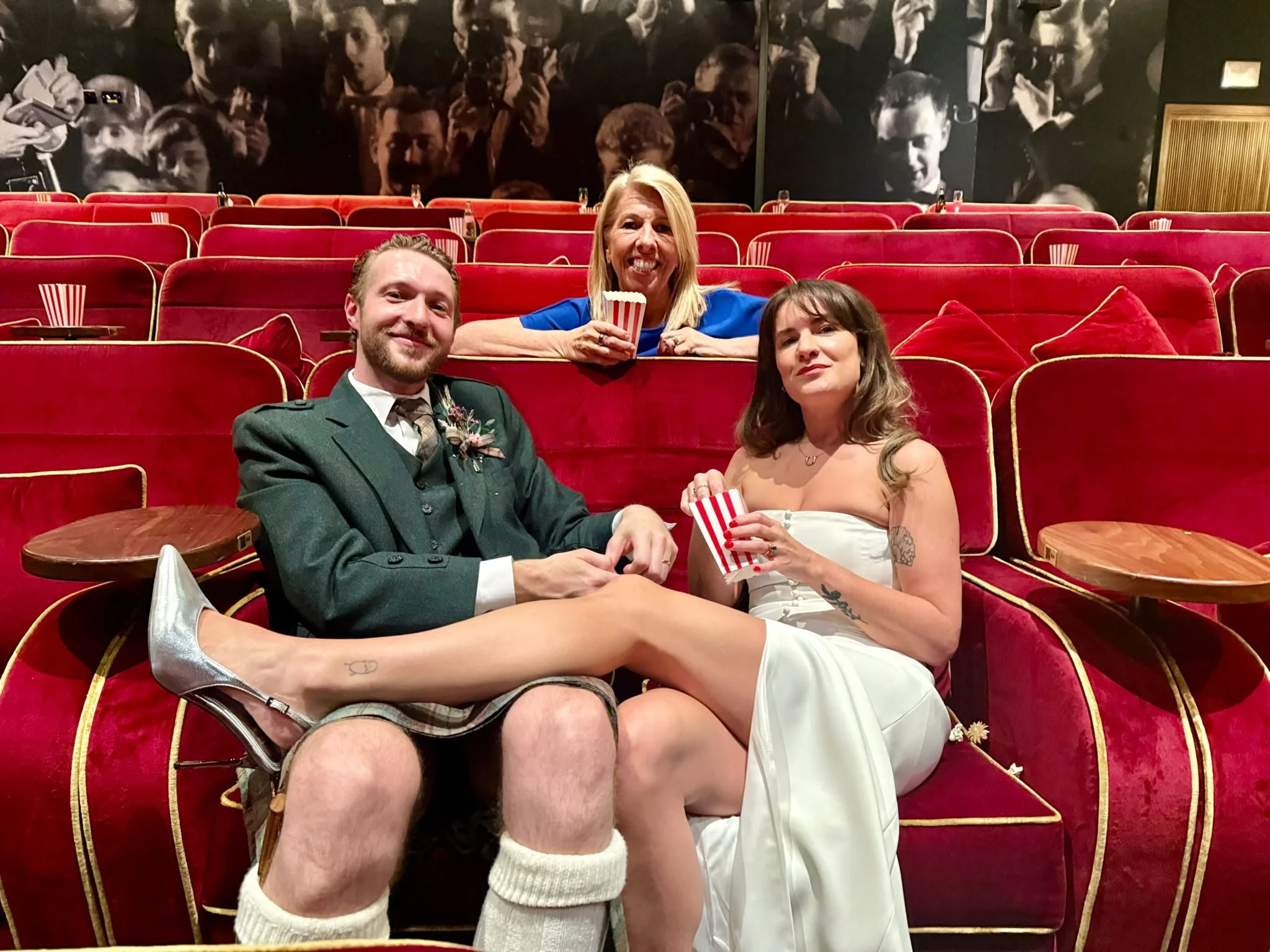 Kirsten with a couple who got married in a cinema
